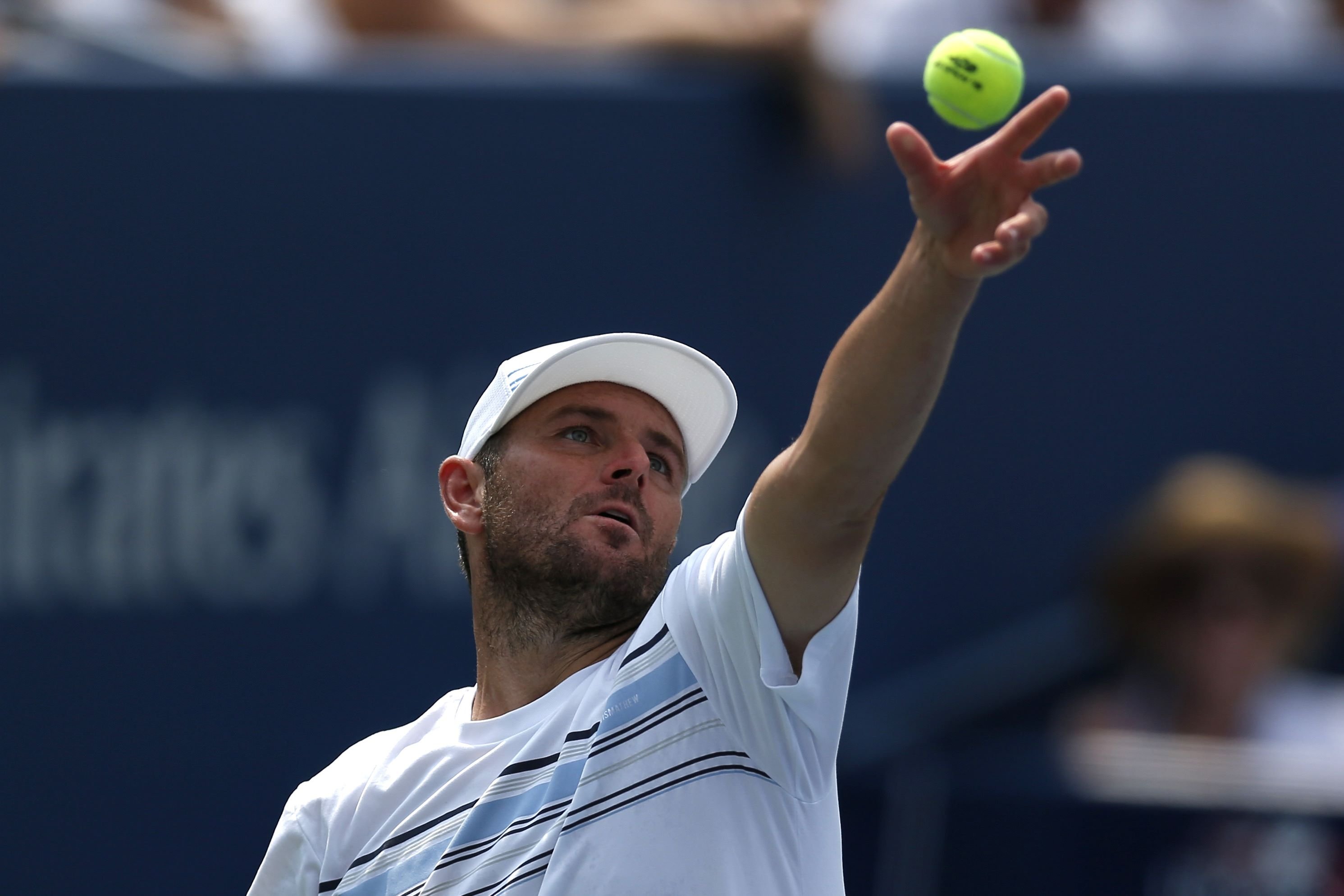 Mardy Fish of the United States retired after his loss to Feliciano Lopez. Photo: AFP