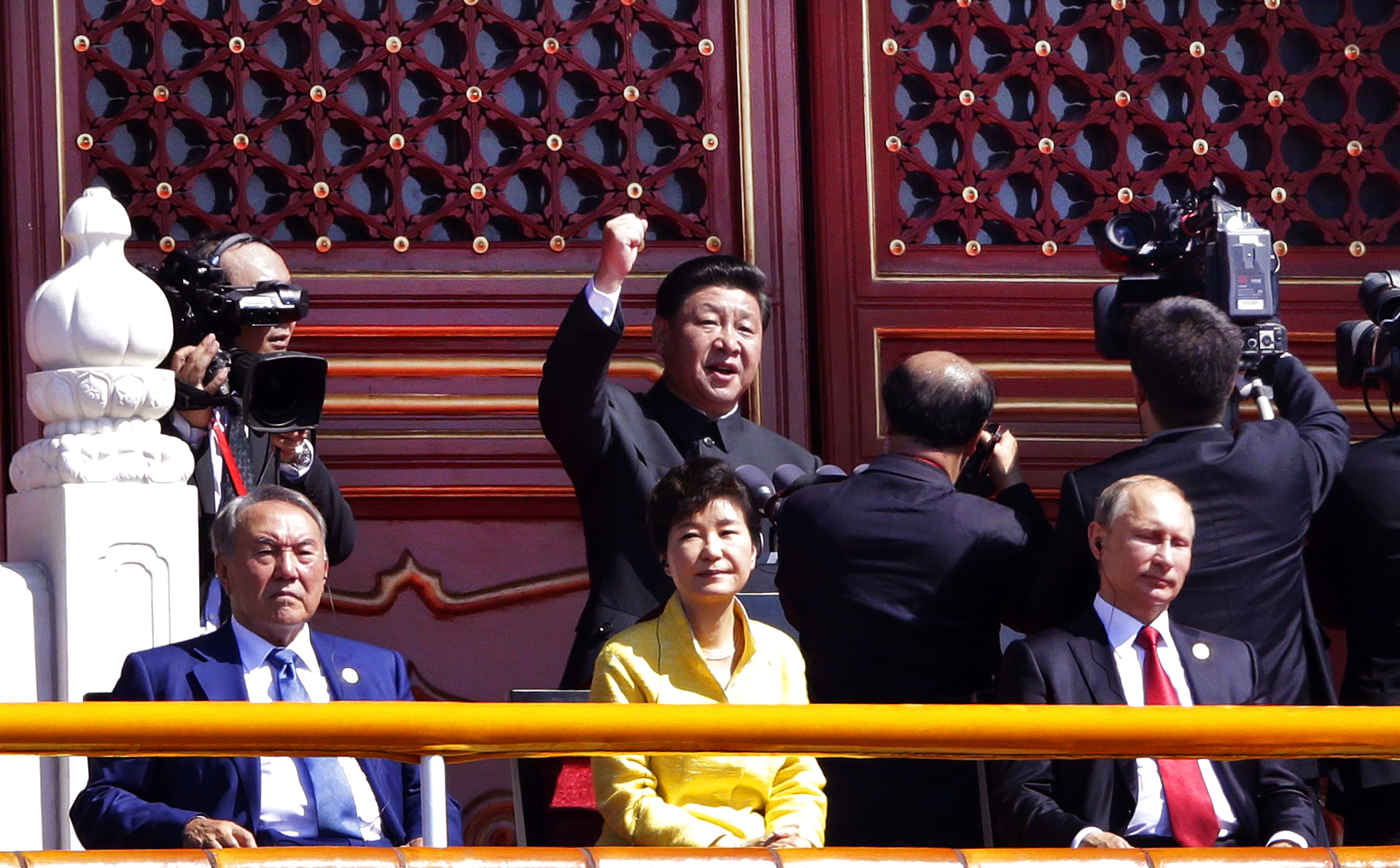 China's President Xi Jinping (centre at rear) gestures as he delivers a speech behind Russia's President Vladimir Putin (right), South Korea's President Park Geun-hye (centre) and Kazakhstan President Nursultan Nazarbayev (left)  during a military parade at Tiananmen Square in Beijing to mark the 70th anniversary of victory over Japan and the end of World War II. Photo: AFP