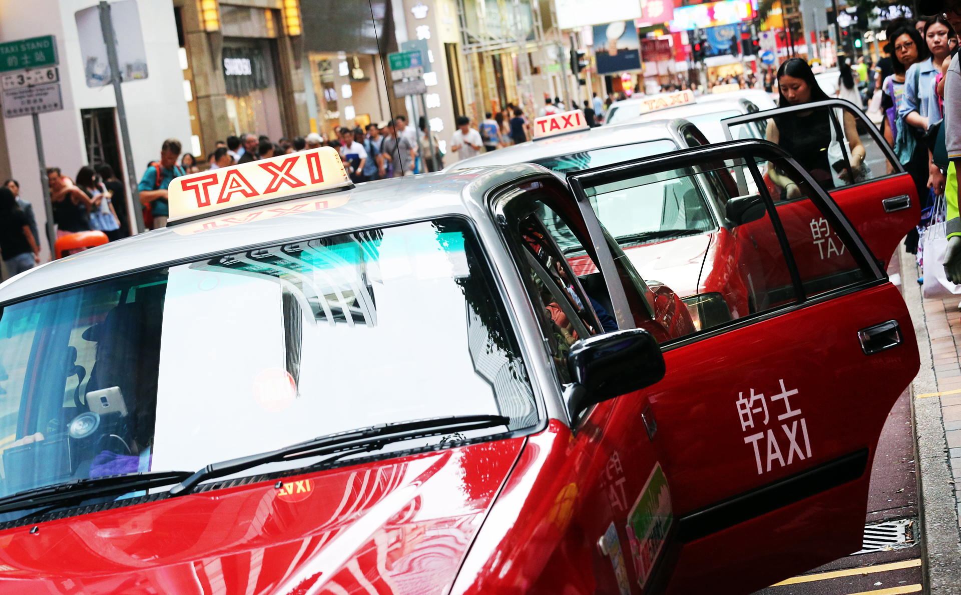 Although the price of a Toyota Crown Comfort taxi is only HK$230,000, the cost of buying a licence to operate one is at present about HK$7 million. Photo: David Wong
