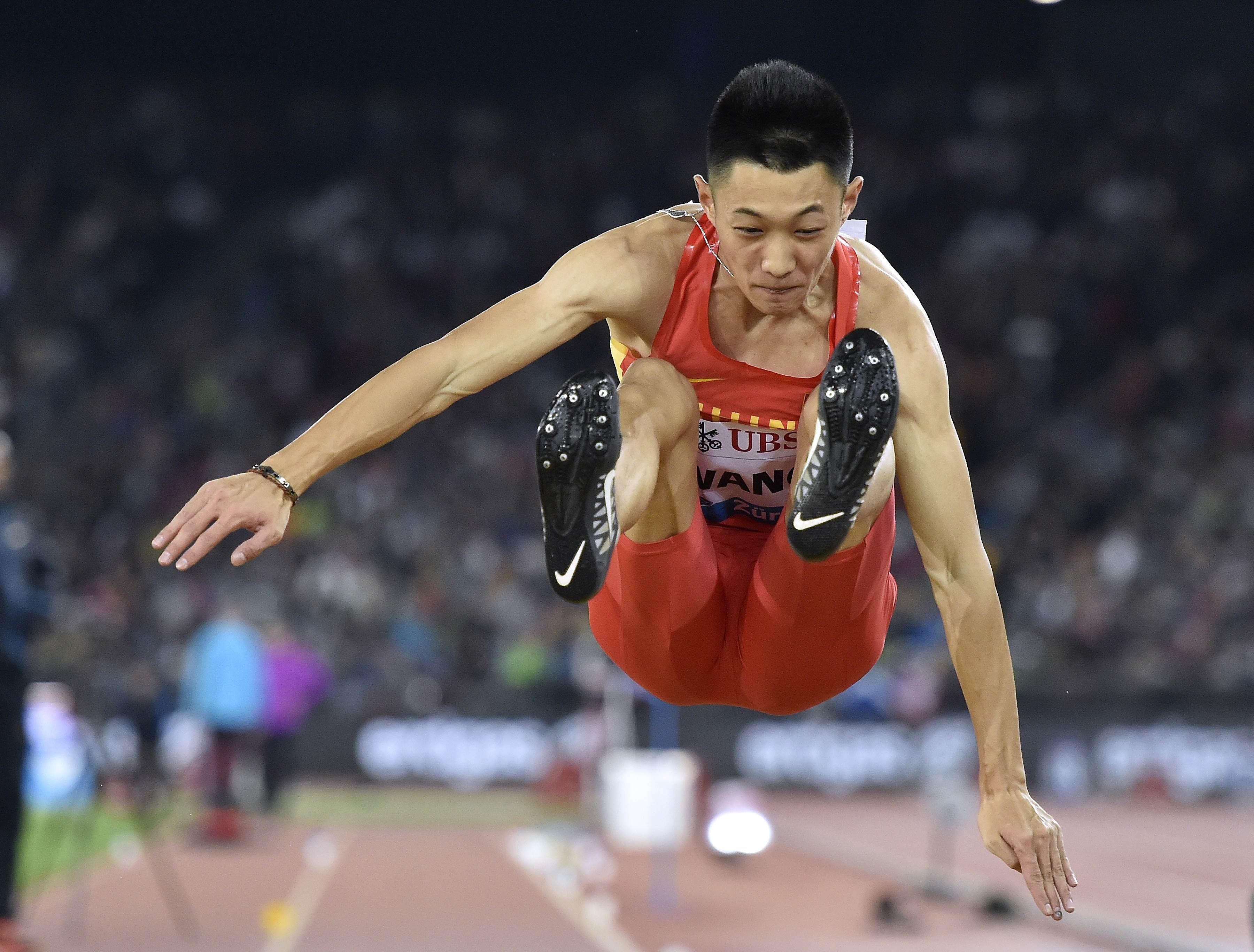 China's Jianan Wang competes in the men's long jump. Photo: AFP
