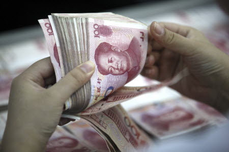 Cross-border yuan payments grew by 173 per cent in South Korea in July. Photo: AP
