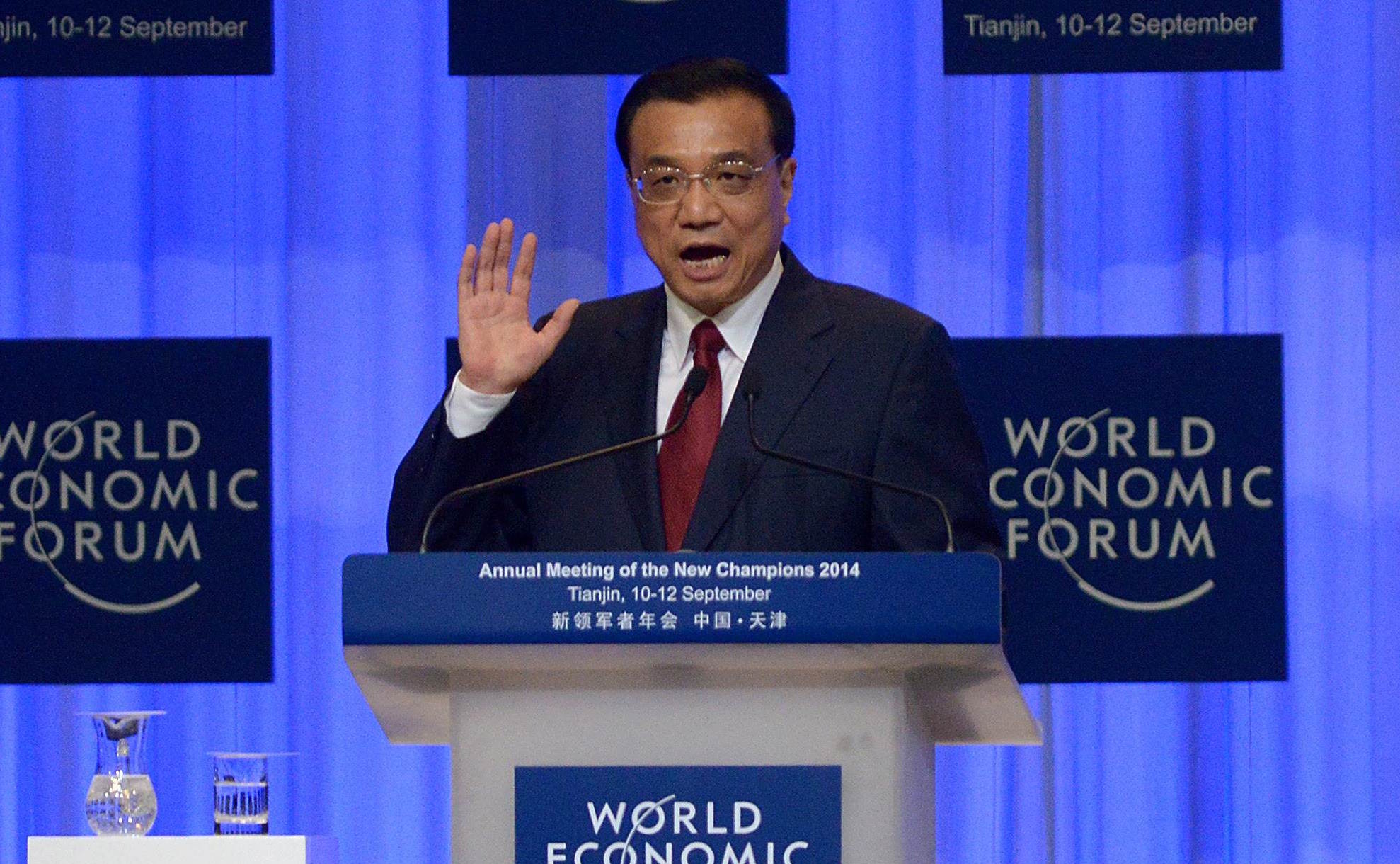 Chinese premier Li Keqiang speaks at the 2014 World Economic Forum summit in Dalian, China. Photo: AFP