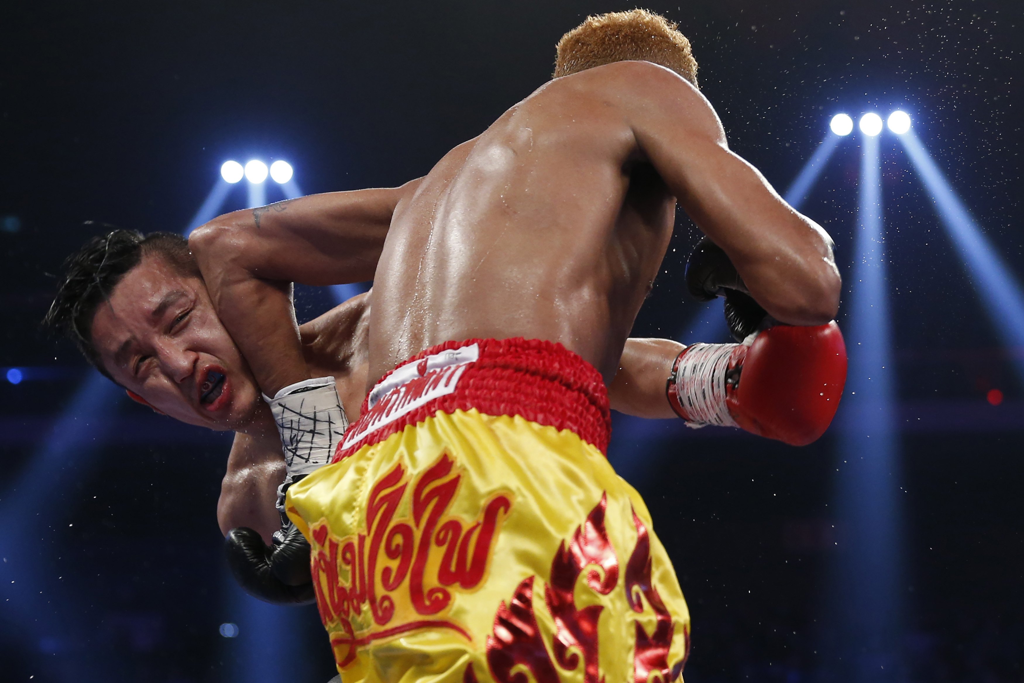 Zou Shiming in action during his defeat last time out. Photo: Reuters