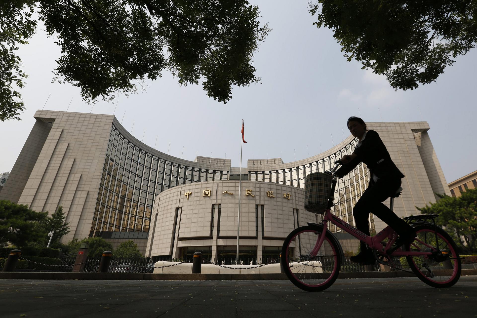 China's banking industry is entering a new chapter with the People's Bank of China changing the rules on the loan-deposit and reserve requirement ratios. Photo: EPA