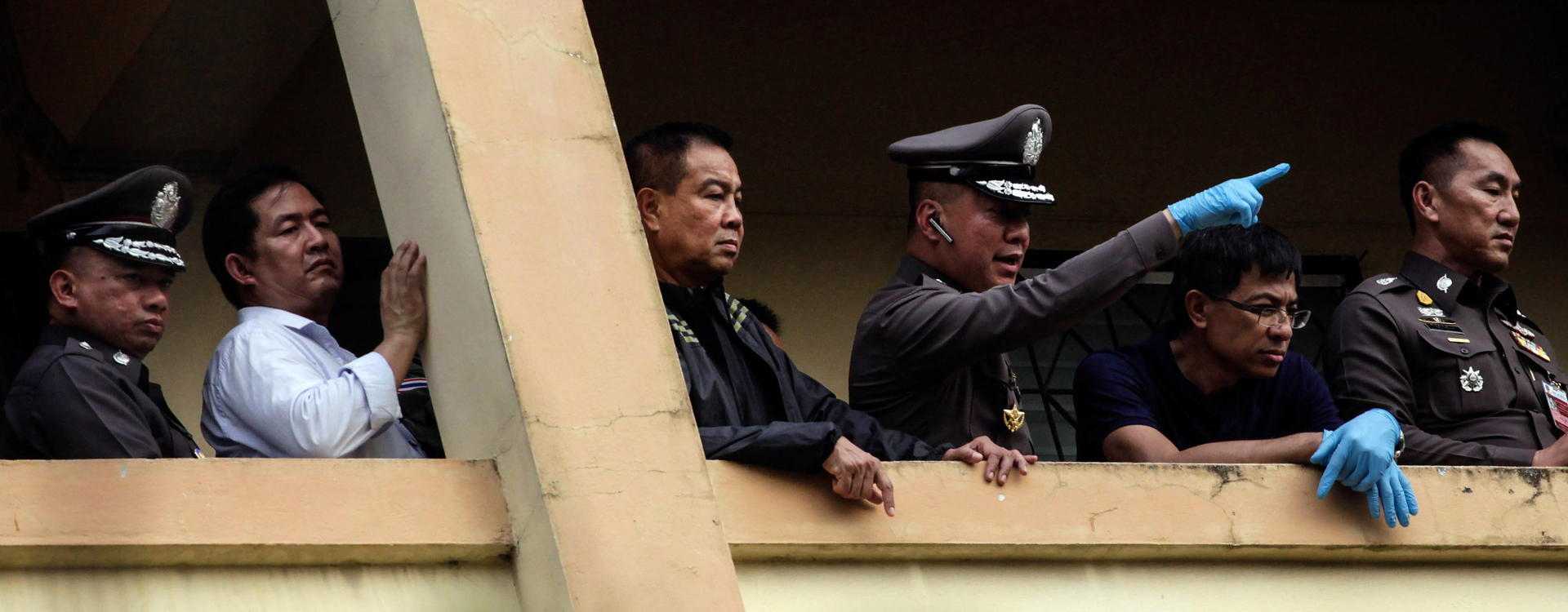 Somyot Poompanmoung, Lieutenant General of the Thai police (centre). Photo: Bloomberg
