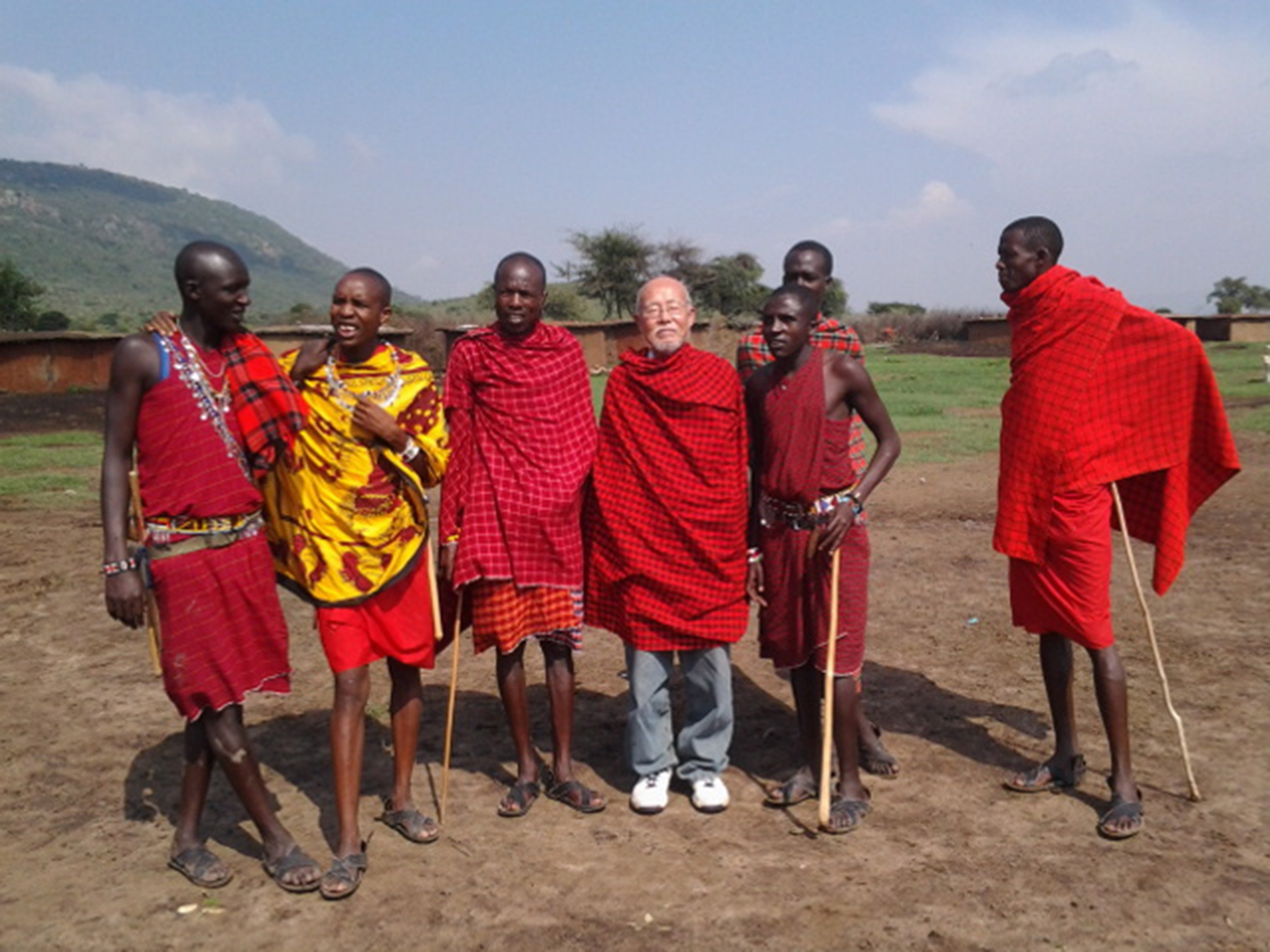 Unlike millennial backpackers, 76-year-old Hyo So commits things to memory rather than snapping photos on his travels. The only photos he has are ones other travellers take of or with him and e-mail him, like this from with Maasai tribesmen in Kenya. Photos: TNS