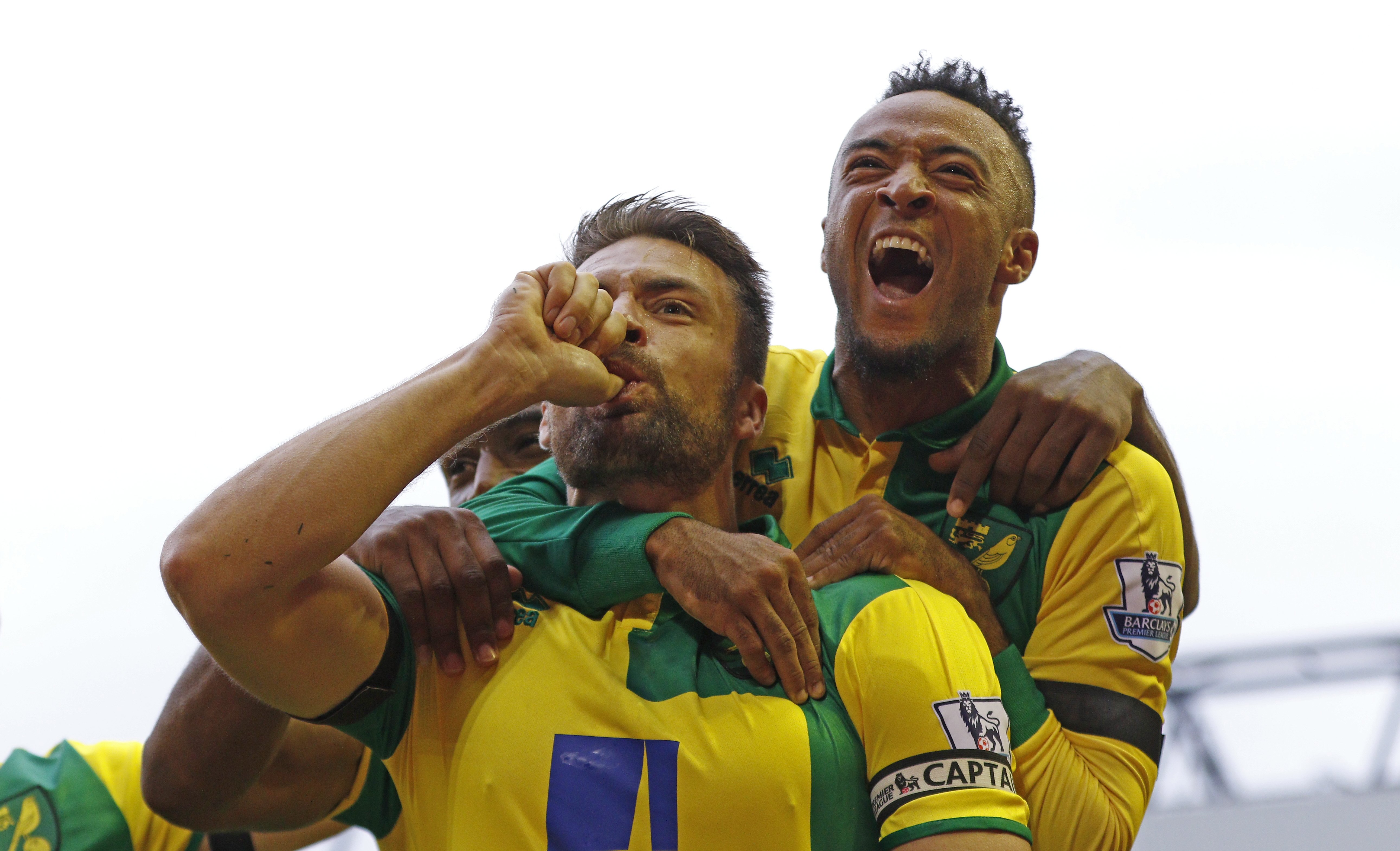 Happy birthday! Norwich's Russell Martin rushes back from birth of his son  to deliver a goal against Liverpool