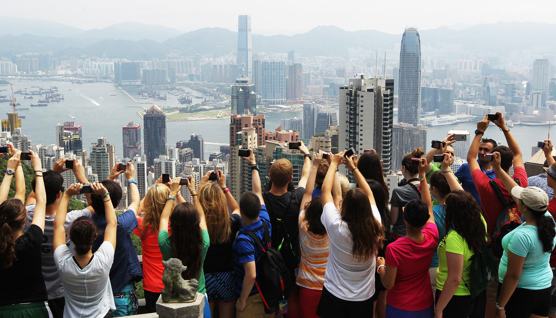 Visitors capture the view from The Peak. Photo: Edward Wong