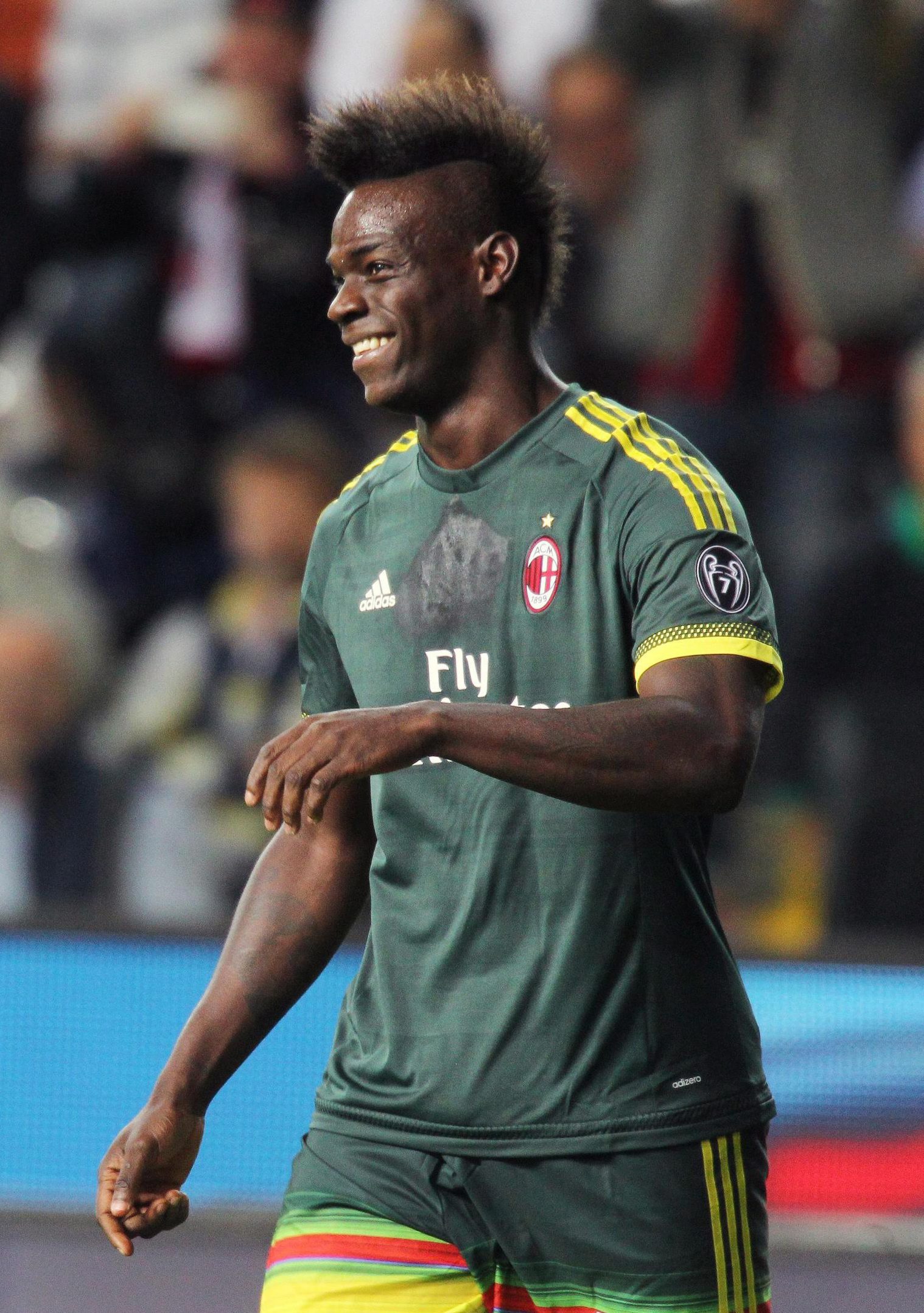 Mario Balotelli smiles after his goal. Photo: EPA