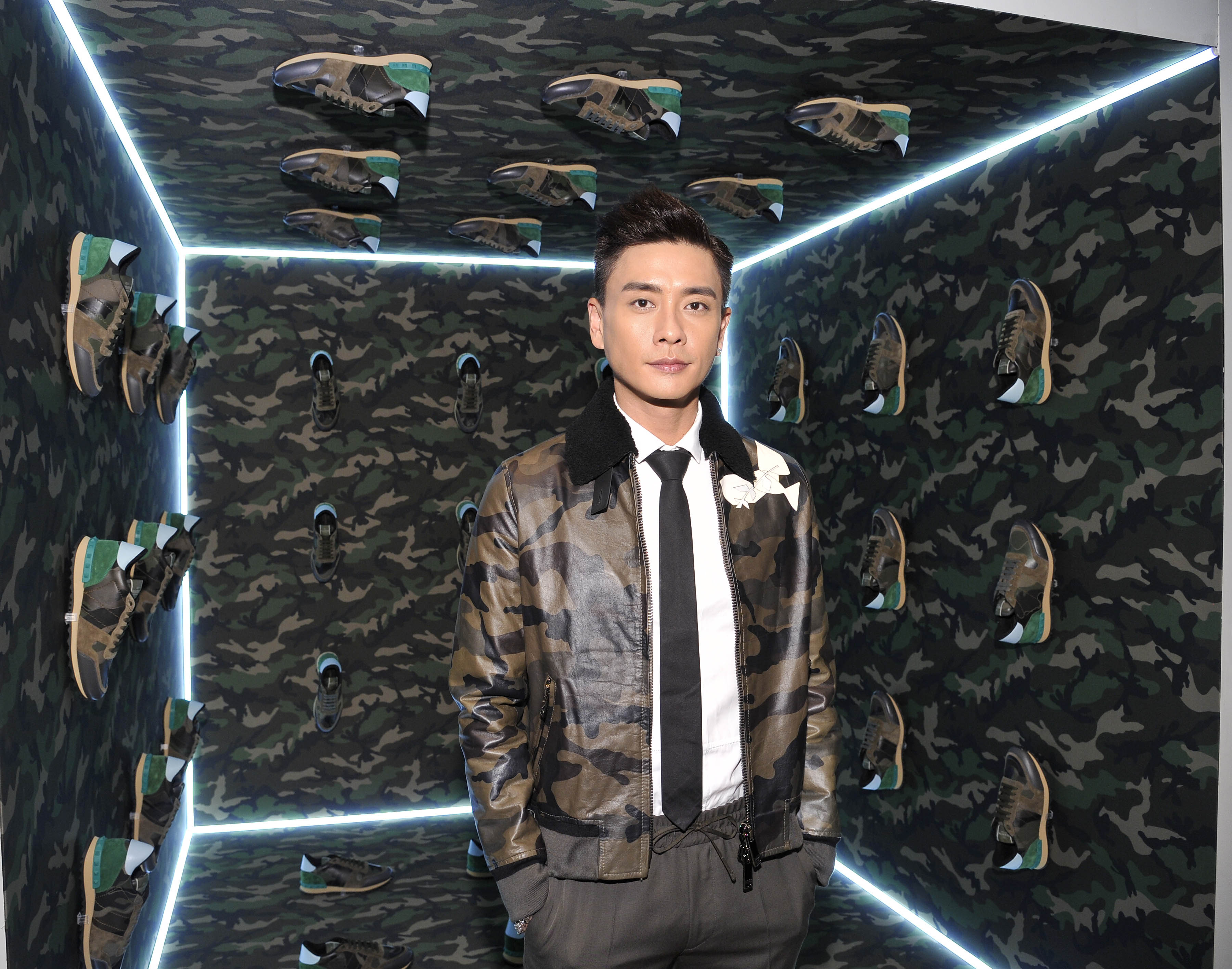 Bosco Wong rocking the camouflage trend at Valentino's pop-up boutique 