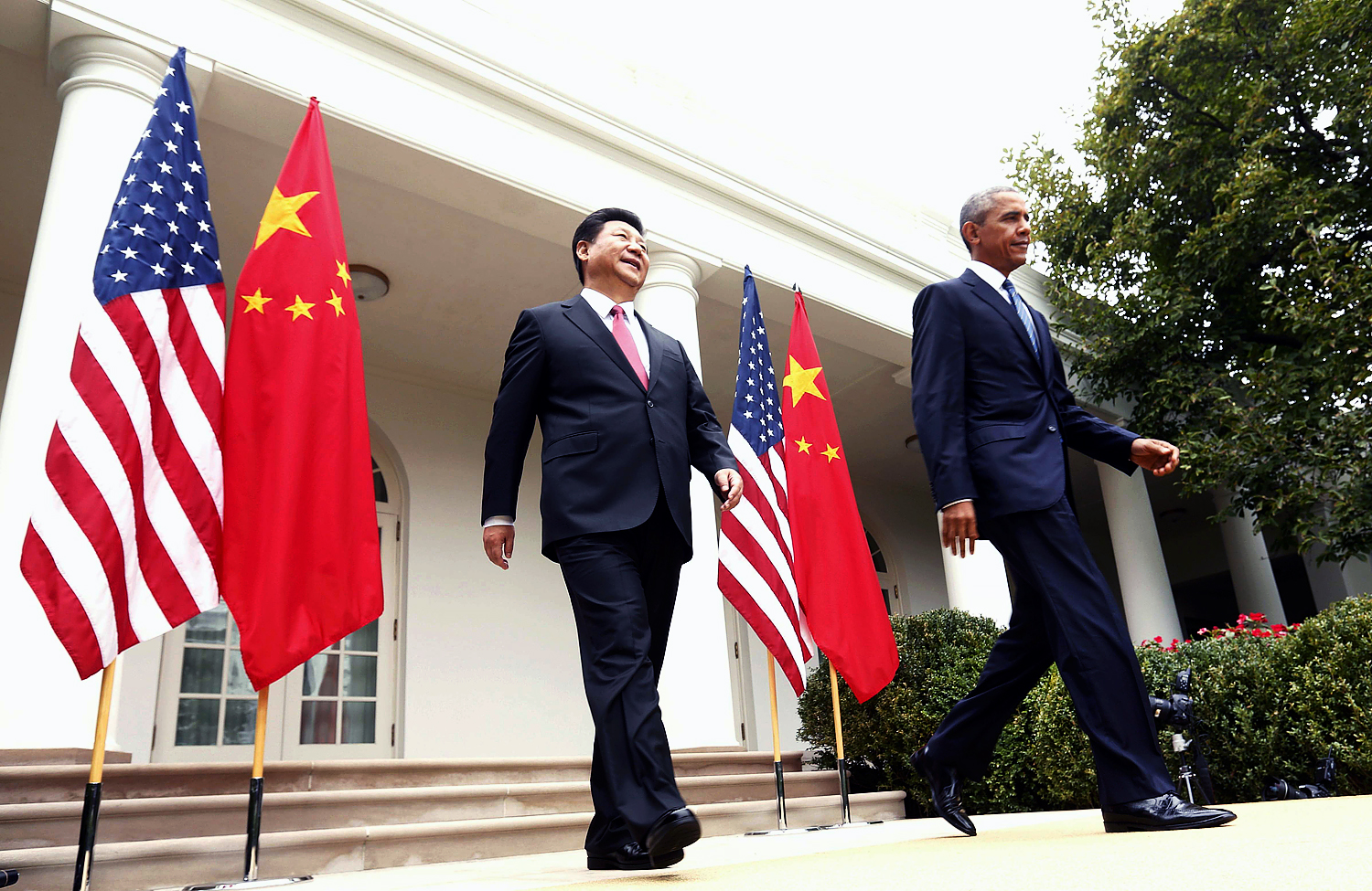 US President Barack Obama (right) and Chinese President Xi Jinping hold a joint news conference at the White House. Photo: Reuters