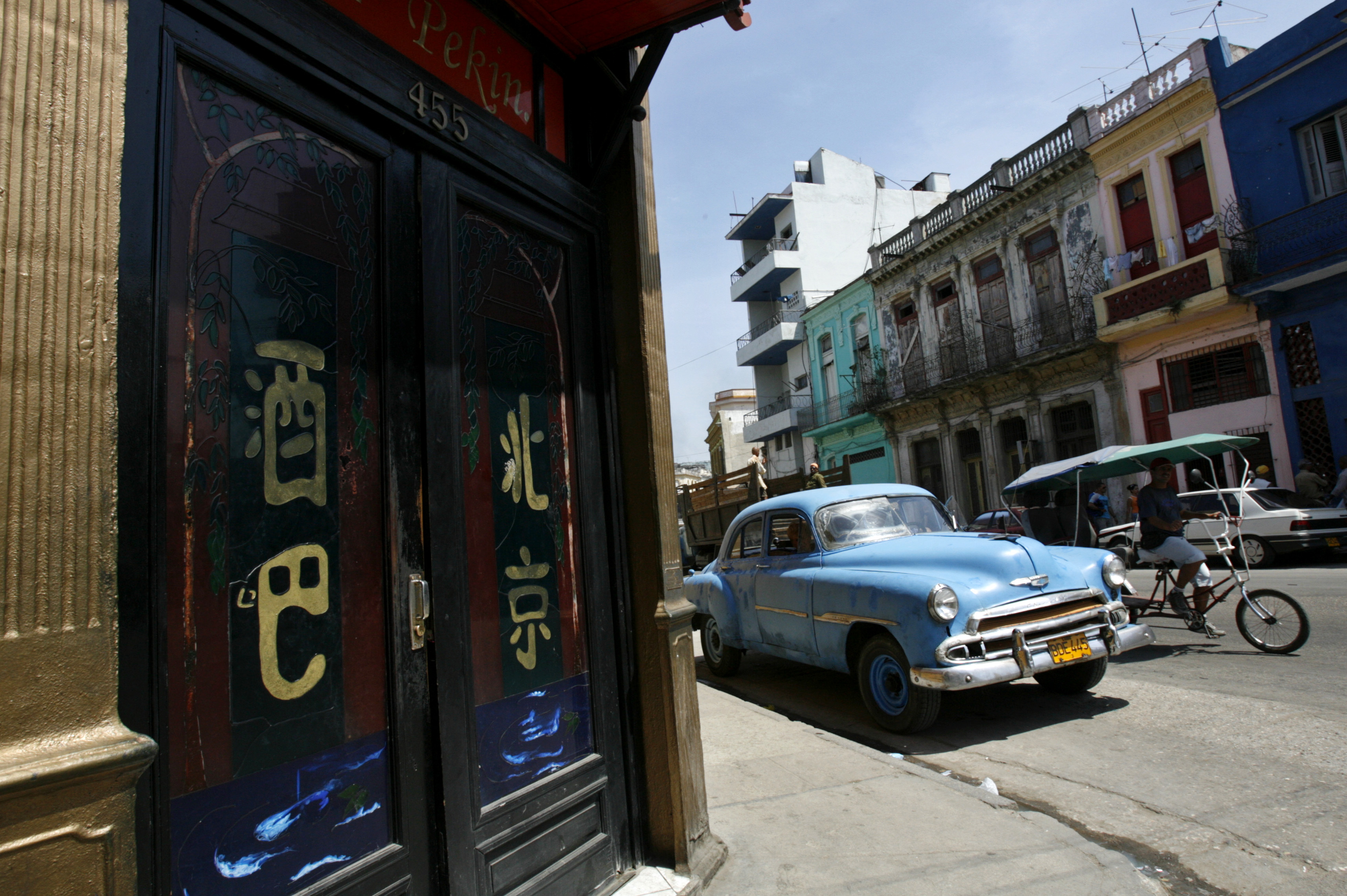 A vintage car parked outside the Beijing Bar in Havana's Chinatown. Photo: Reuters