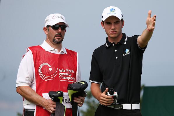 Ryan Ruffels discusses a shot with his caddie. Photos: AAC