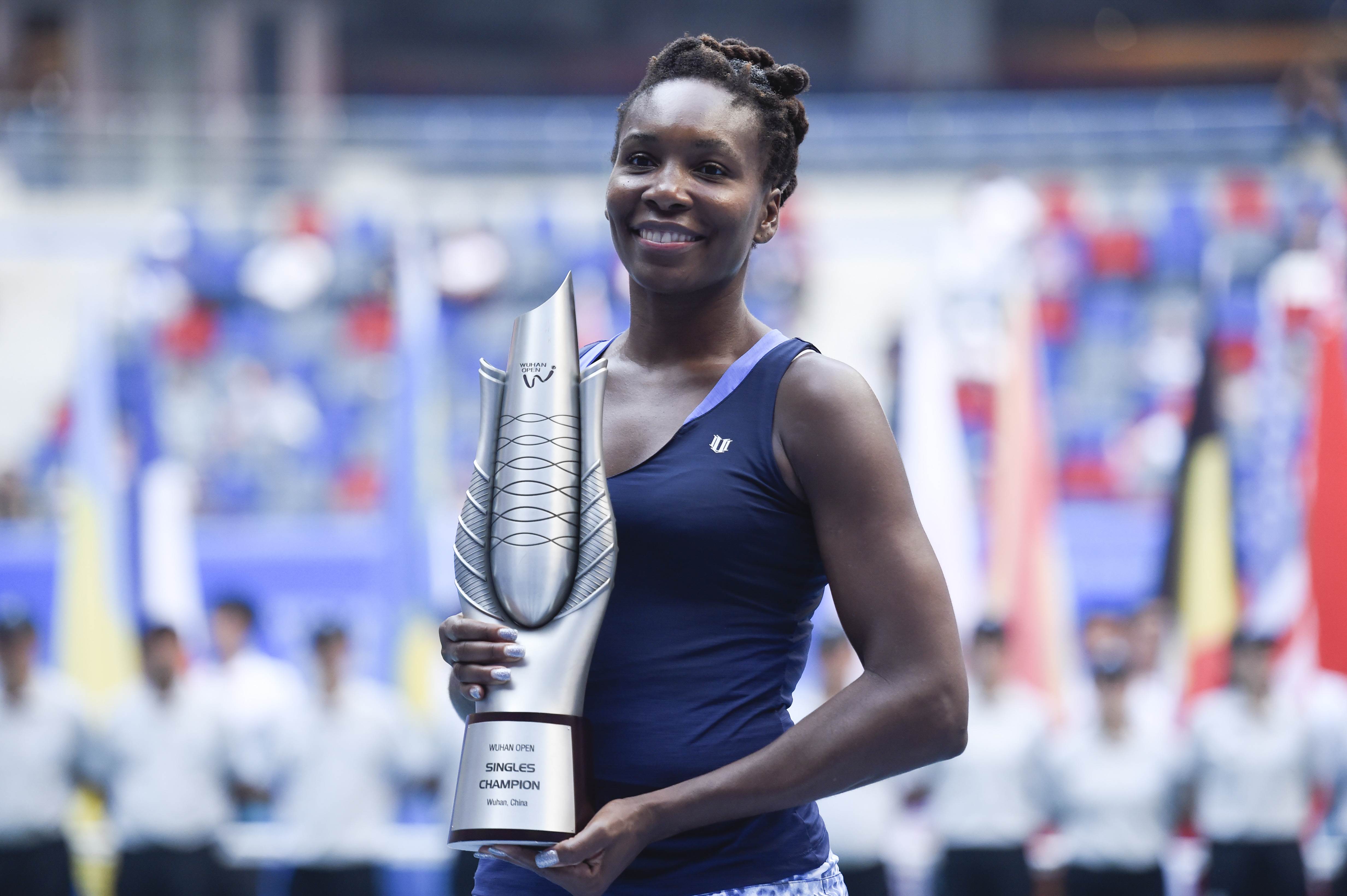 Venus Williams celebrates with the Wuhan Open trophy. Photo: AFP