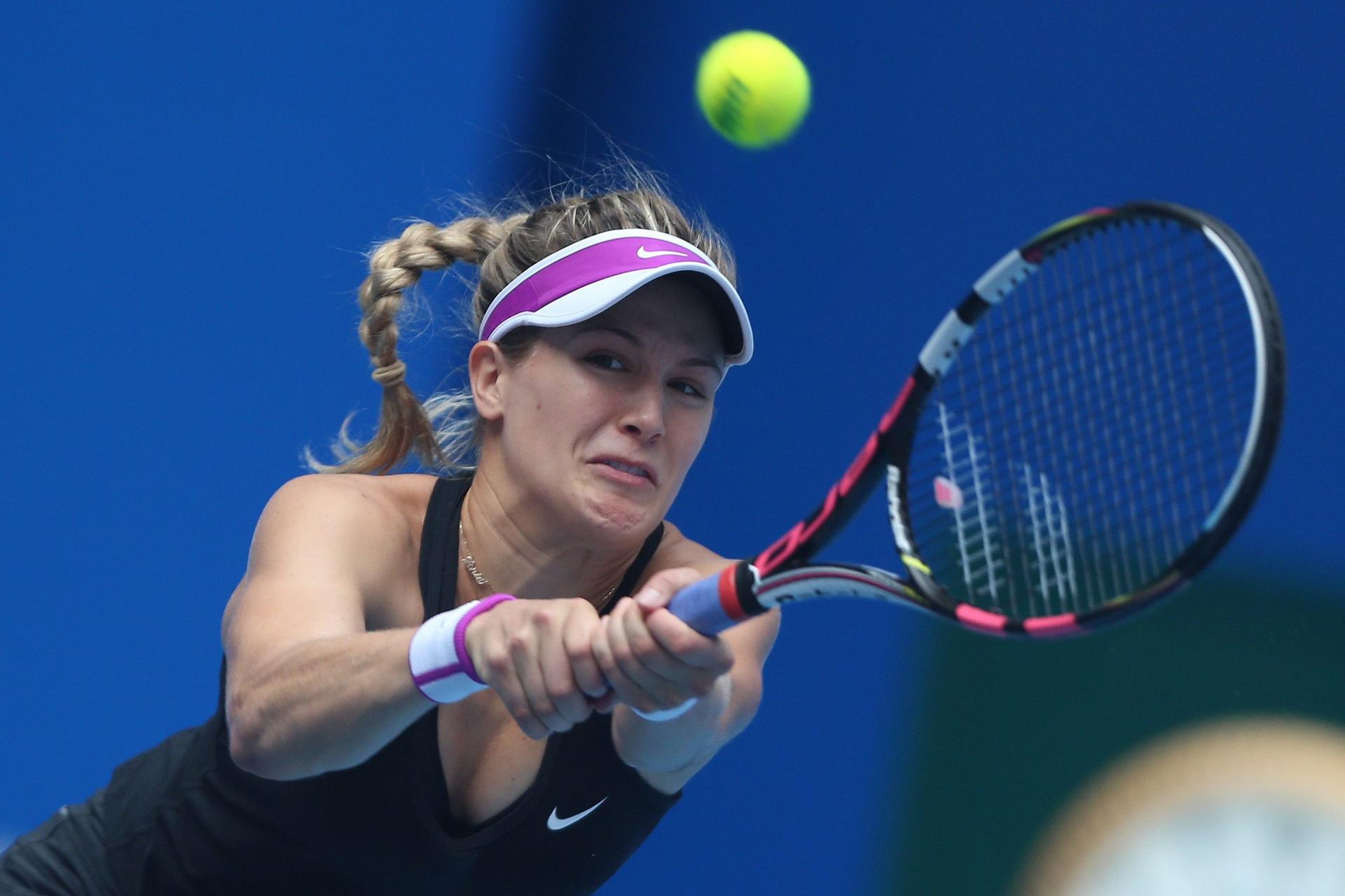 Eugenie Bouchard makes a return before retiring from her game against Andrea Petkovic at the China Open. Photo: EPA