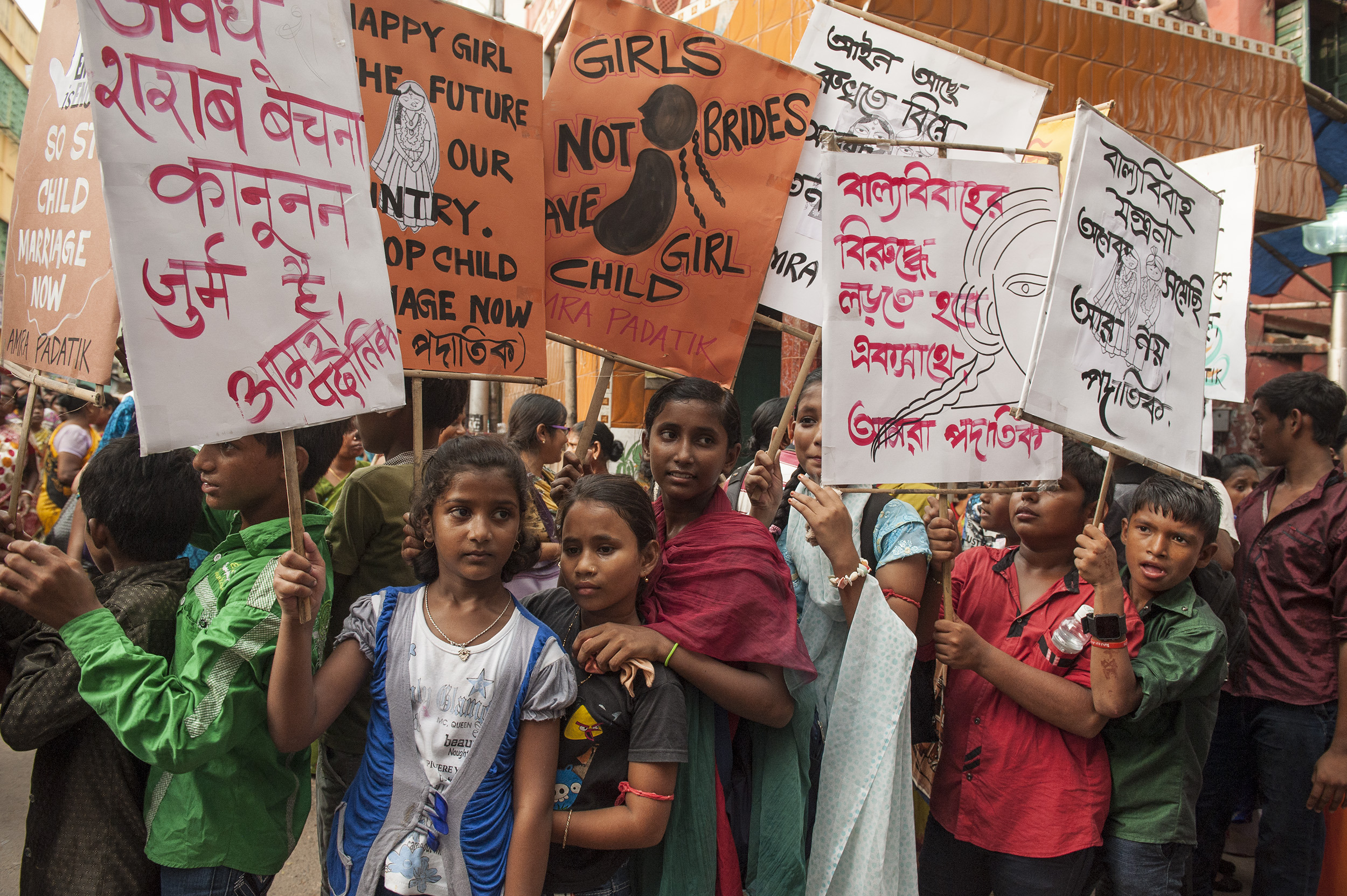 Children of sex workers take part in a rally in Calcutta to raise awareness against child marriage. Every year, at least 15 million girls under 18 get married. Photo: Xinhua 