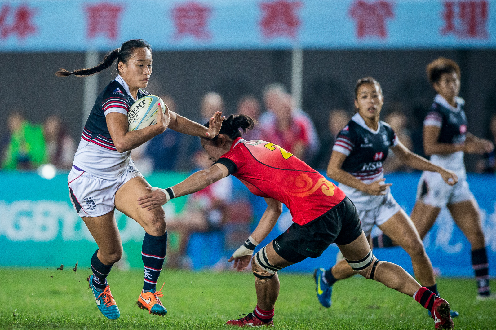 Tour skipper Christy Cheng Ka-chi leads from the front en route to Hong Kong’s Cup final triumph over the hosts at the China Sevens in Qingdao. Photos: HKRU