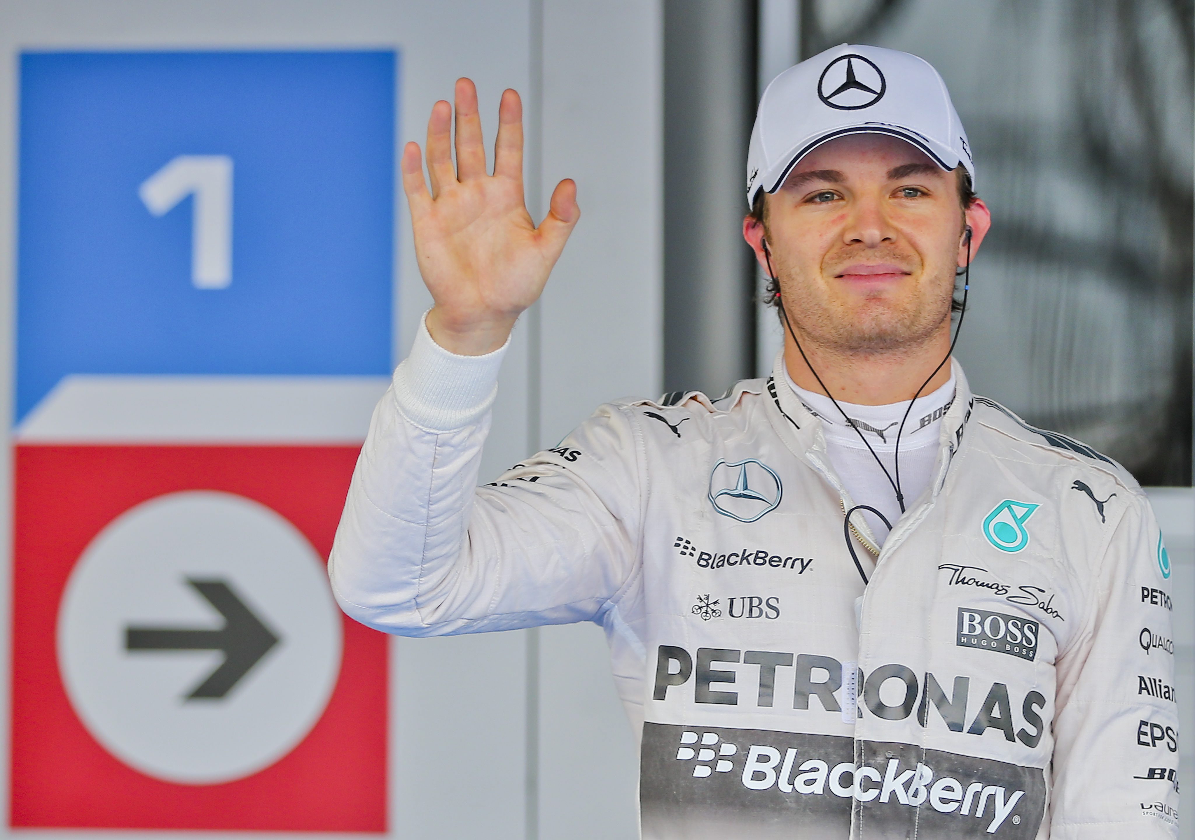 Nico Rosberg of Germany waves to the crowd after taking pole position for Sunday's Russian Grand Prix. Photo: EPA