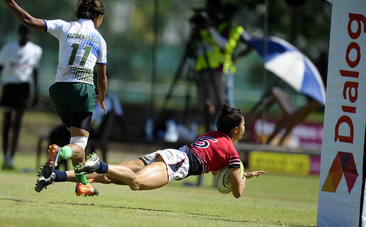 Hong Kong’s Sham Wai-sum dives over to score the first of her two tries in a 52-0 pool win against Uzbekistan on Saturday. Photos: Asia Rugby