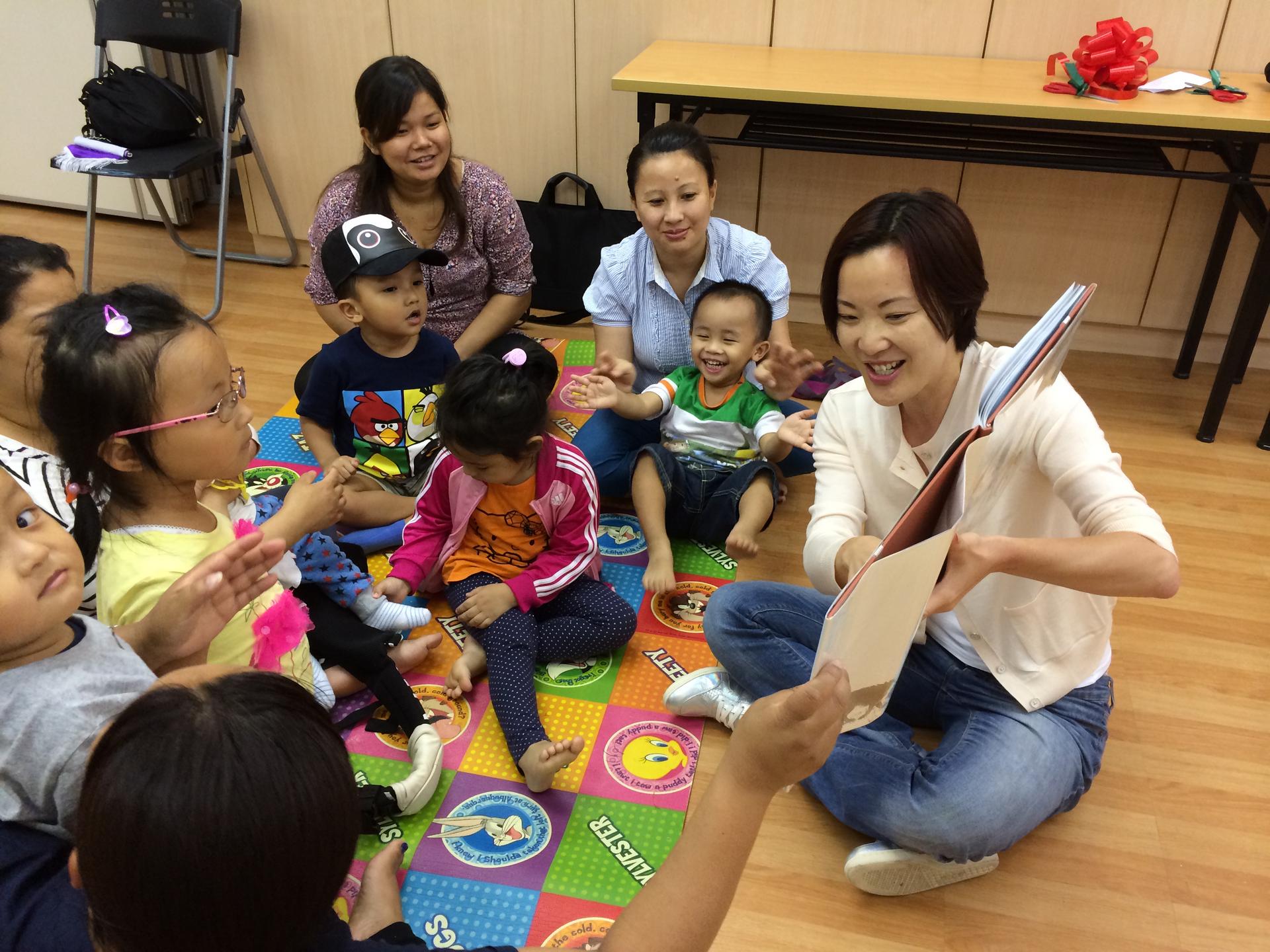Michelle Liu from Bring Me A Book Hong Kong reads to children.