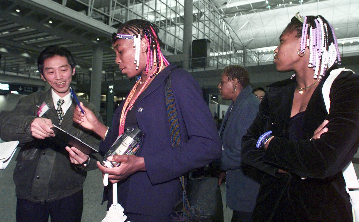 Venus and sister Serena arrive at Hong Kong airport, where they were instantly recognised, for their first visit in 1999. Photo: Dustin Shum