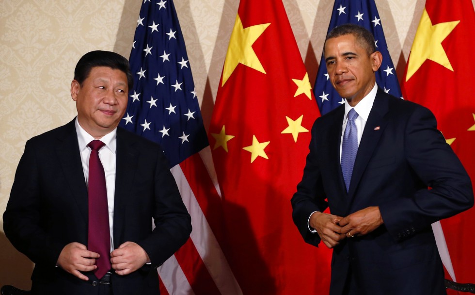 US President Barack Obama meets President Xi Jinping on the sidelines of a summit in The Hague in 2014. Photo: Reuters
