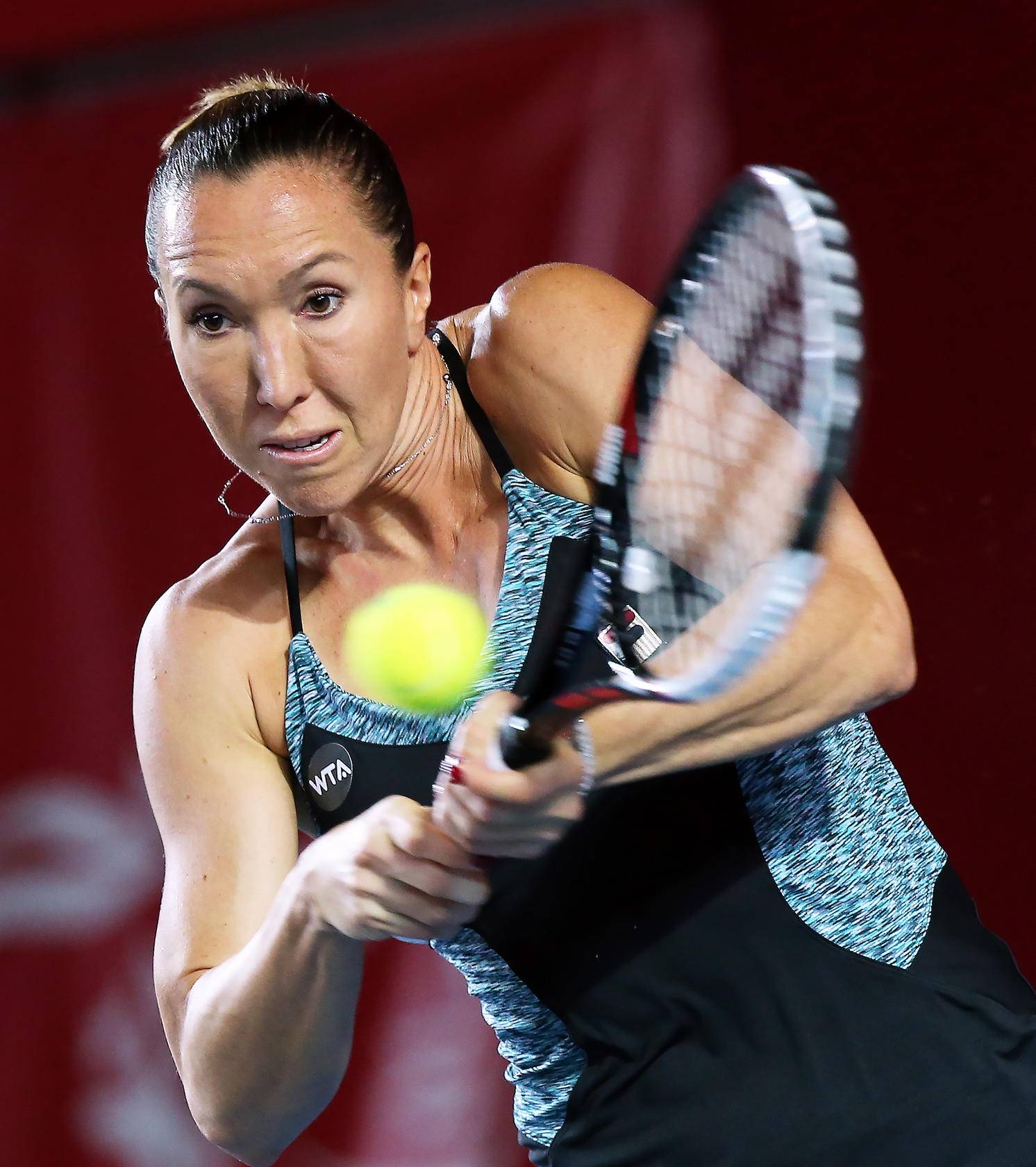 Jelena Jankovic of Serbia fires back a return to Australian opponent Anastasia Rodionova at the Prudential Hong Kong Tennis Open. Photos: K.Y. Cheng