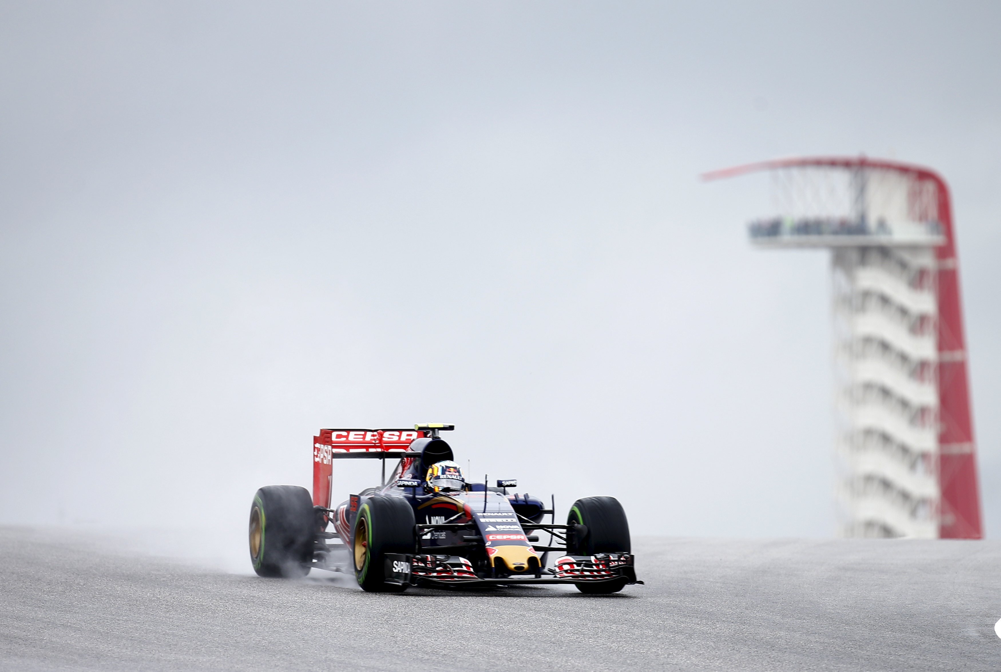 Toro Rosso's Carlos Sainz Jnr battles with the wet track before the cancellation of the day's practice session. Photo: Reuters