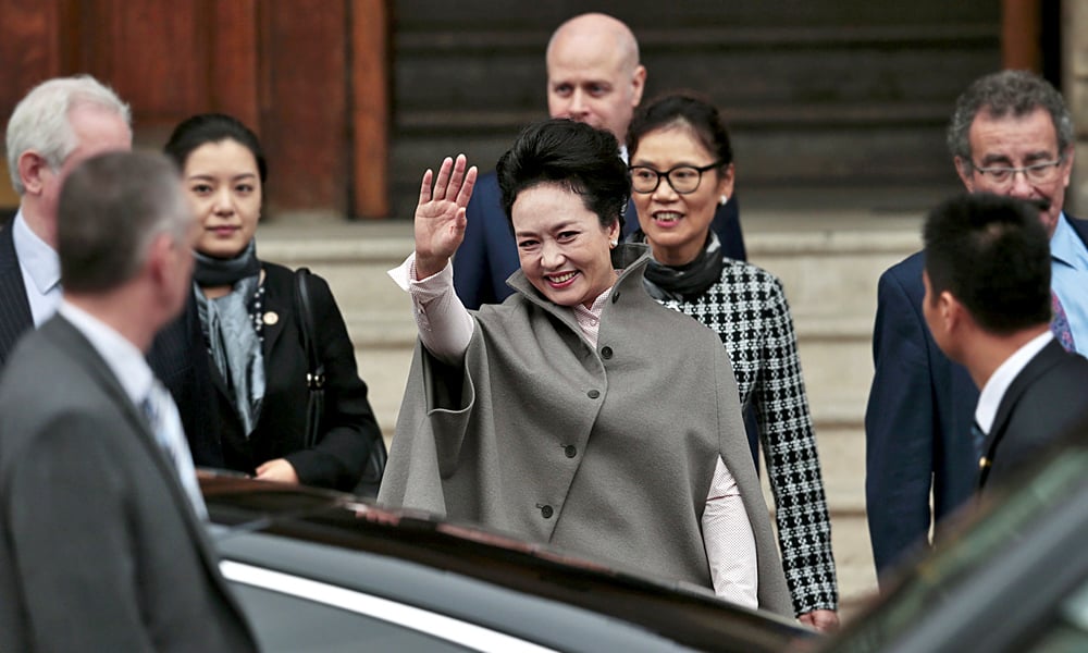 Chinese first lady Peng slipped away from the pomp, politics and deal-making of President Xi Jinping's state visit to stop by The Royal College of Music in London. Photo: Reuters
