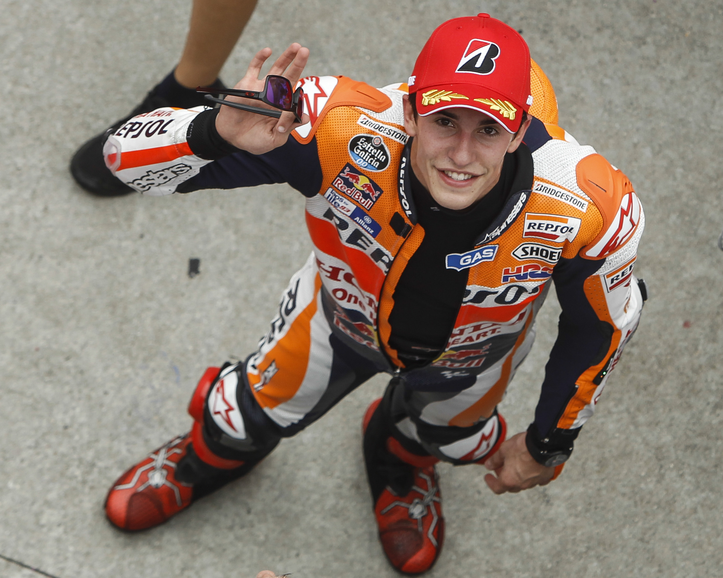 MotoGP rider Marc Marquez of Spain waves at photographers in Sepang, Malaysia. Photo: AP