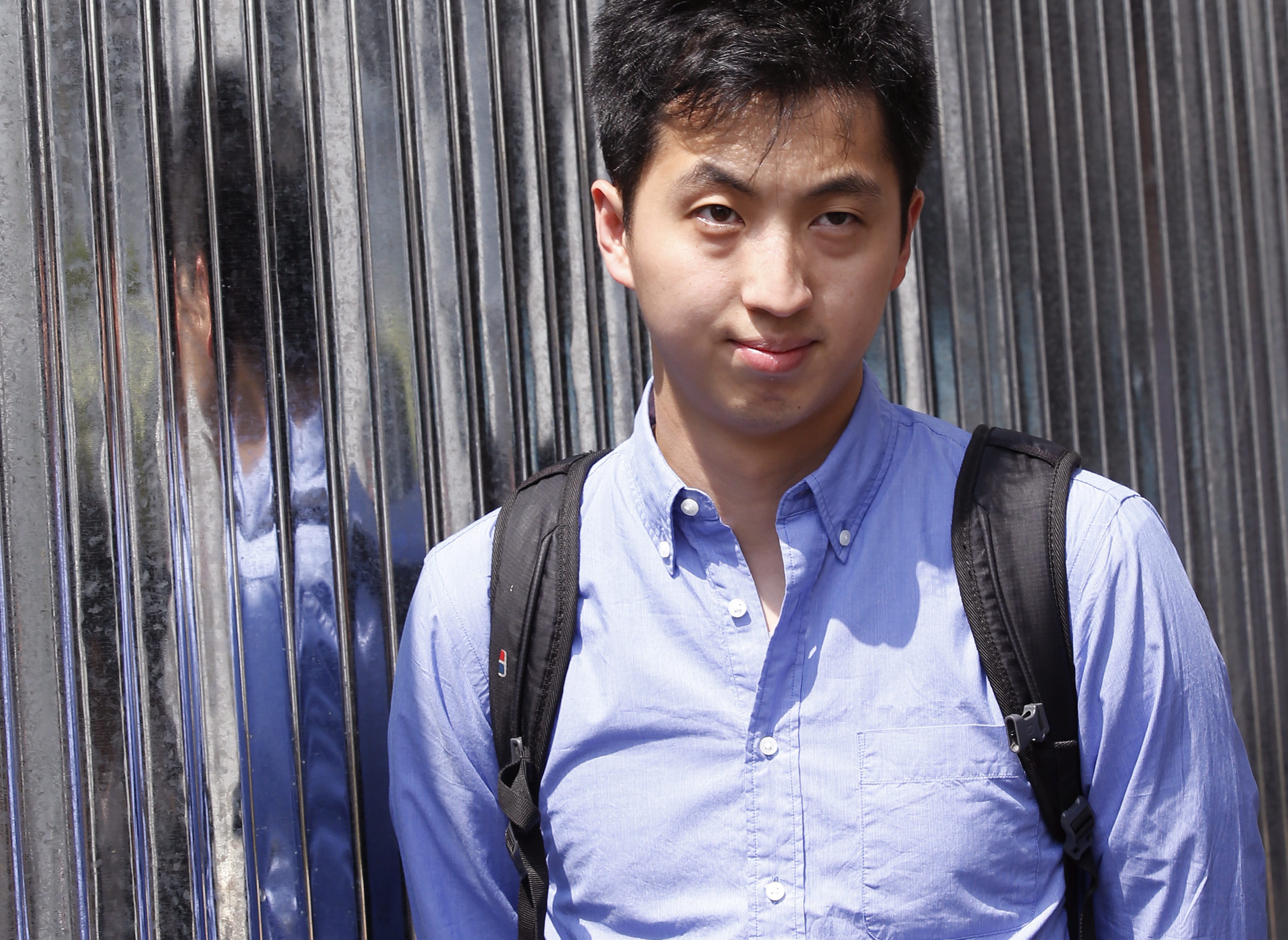 Anthony Kwan Hok-chun arrives at court in Bangkok on Monday. Photo: EPA
