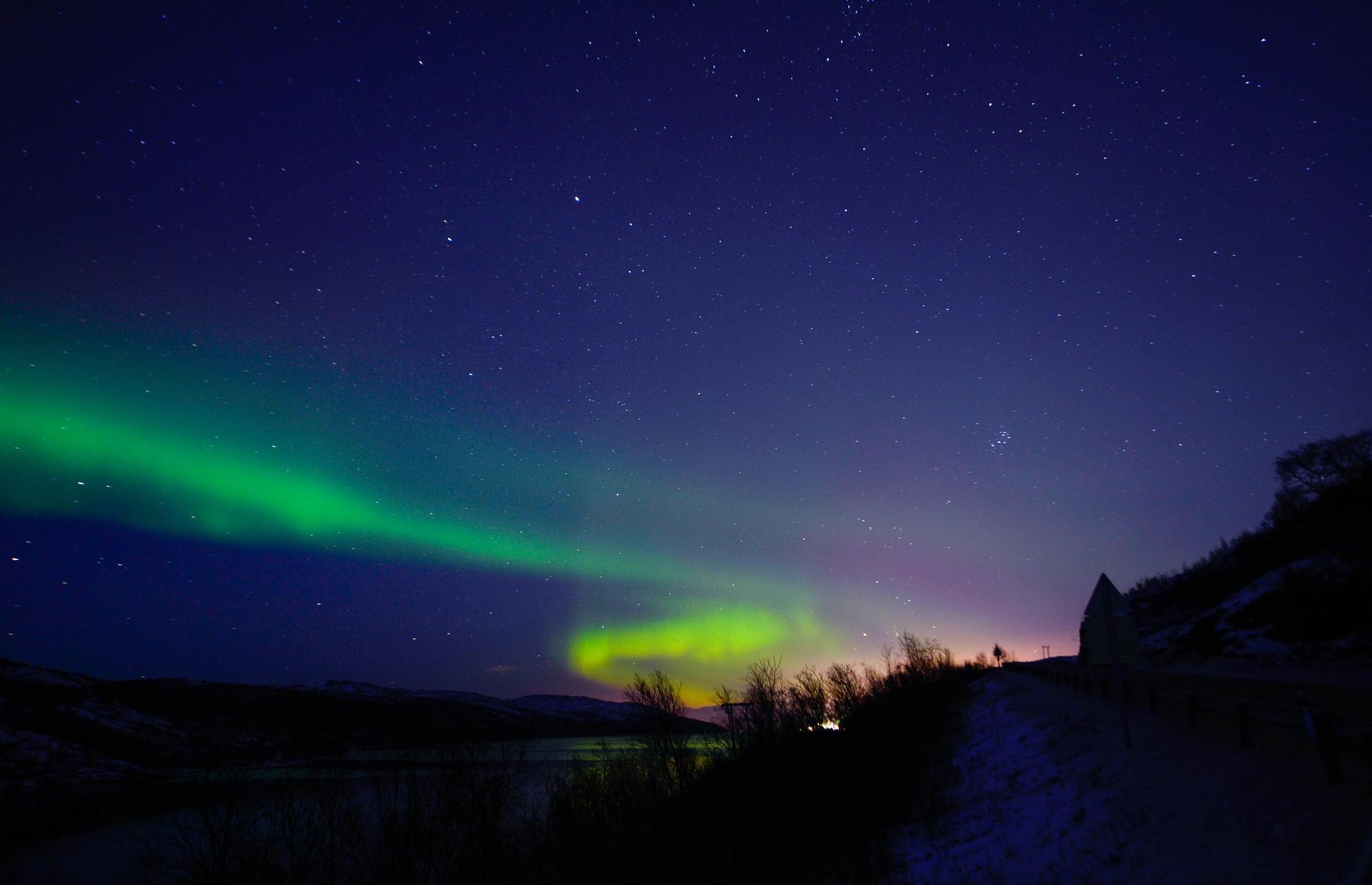 The Aurora Borealis illuminates the night sky near the town of Kirkenes in northern Norway. Photo: AFP