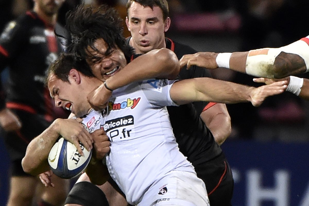 Toulouse flanker Talalelei Gray from Australia (centre rear) wraps up Oyonnax hooker Jeremie Maurouard during their European Rugby Champions Cup at the Stade Ernest Wallon in Toulouse on Saturday. Photos: AFP