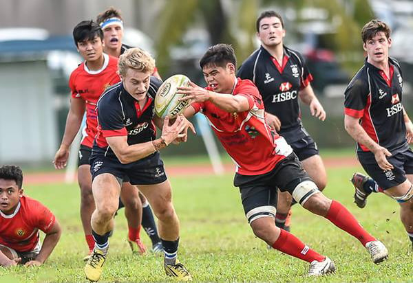 Matt Worley (left) opened the scoring against Singapore when he ran in the first of nine Hong Kong tries on Saturday. Photos: HKRU
