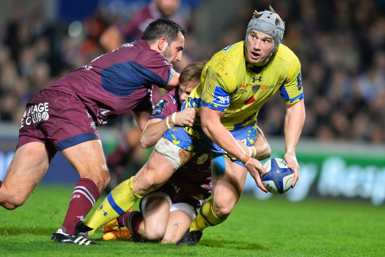 Clermont’s Welsh centre Jonathan Davies prepares to offloads as he is tackled during a European Rugby Champions Cup pool clash against Bordeaux-Bègles at the Stade Jacques-Chaban-Delmas in Bordeaux on Friday. Photos: AFP