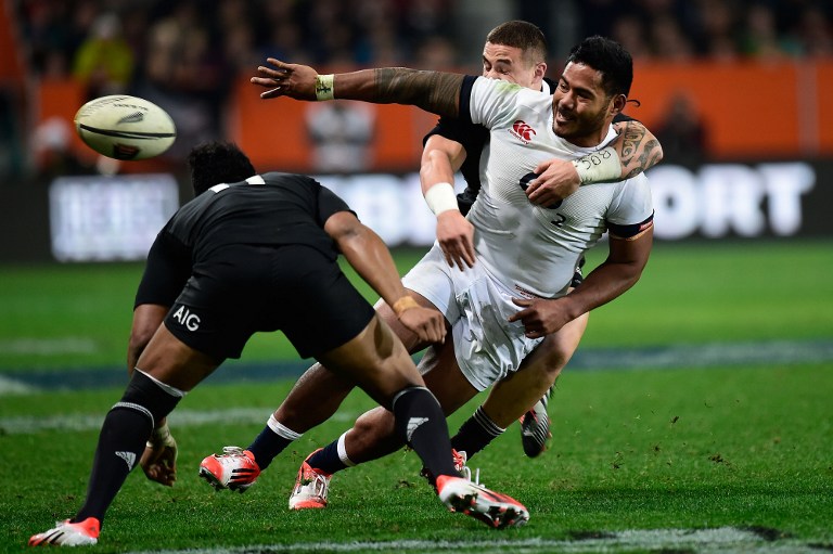 England’s Manu Tuilagi offloads as he is tackled during a match against New Zealand. If he can stay fit, the powerhouse inside centre is expected to figure heavily in Eddie Jones’ plans for the Six Nations. Photos: AFP