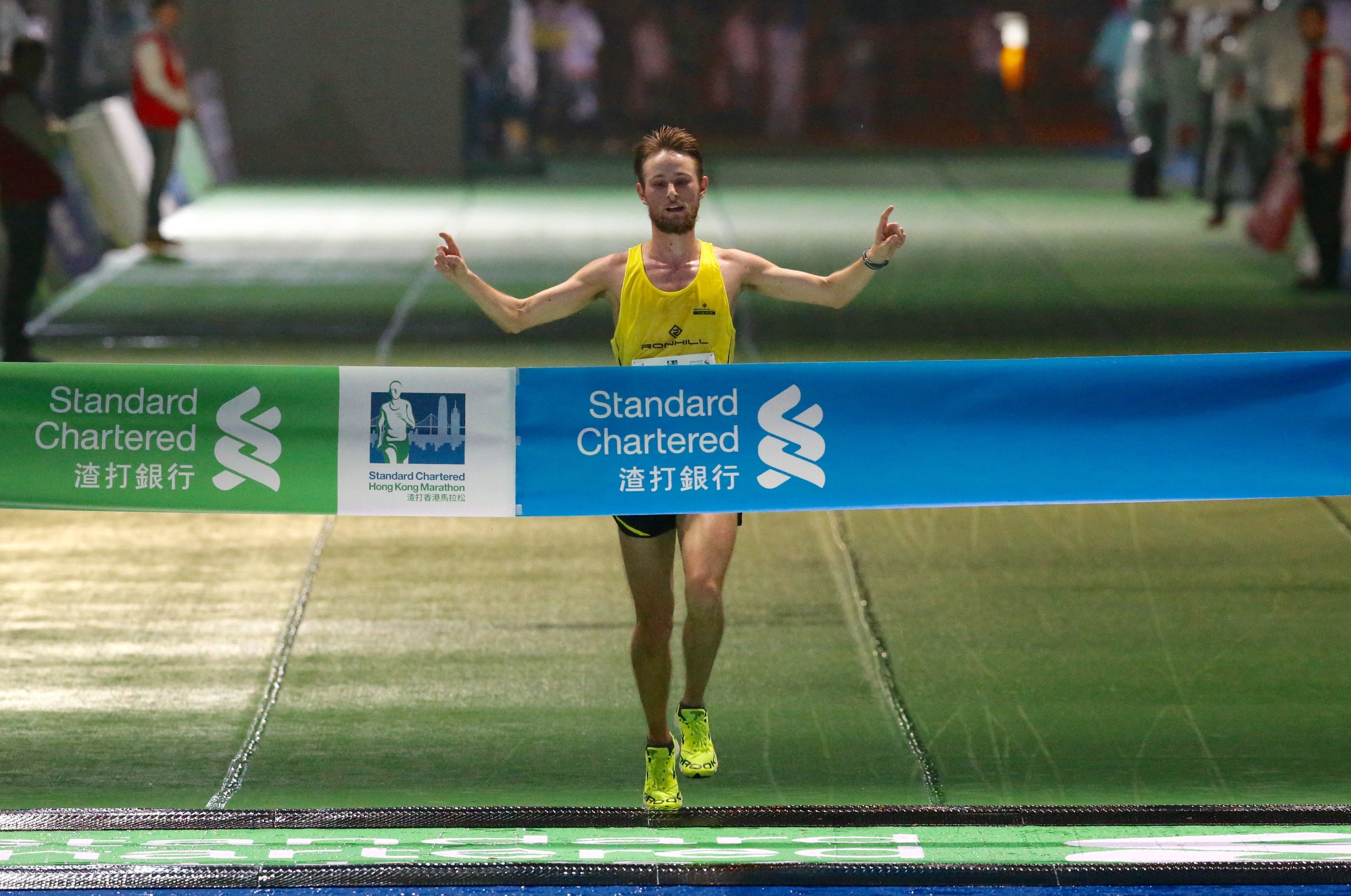 UK's Jack Martin cross the finish line first in the Men's 10km event to set a new course record. Photos: Nora Tam
