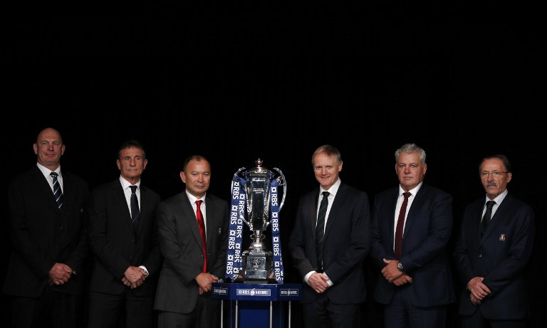International rugby coaches (from left) Scotland’s Vern Cotter, France’s Guy Noves, England’s Eddie Jones, Ireland’s Joe Schmidt, Wales’ Warren Gatland and Italy’s Jacques Brunel pose for a photograph with the trophy at the official launch of the 2016 Six Nations Championship the Hurlingham Club in London on Wednesday. Photos: AFP