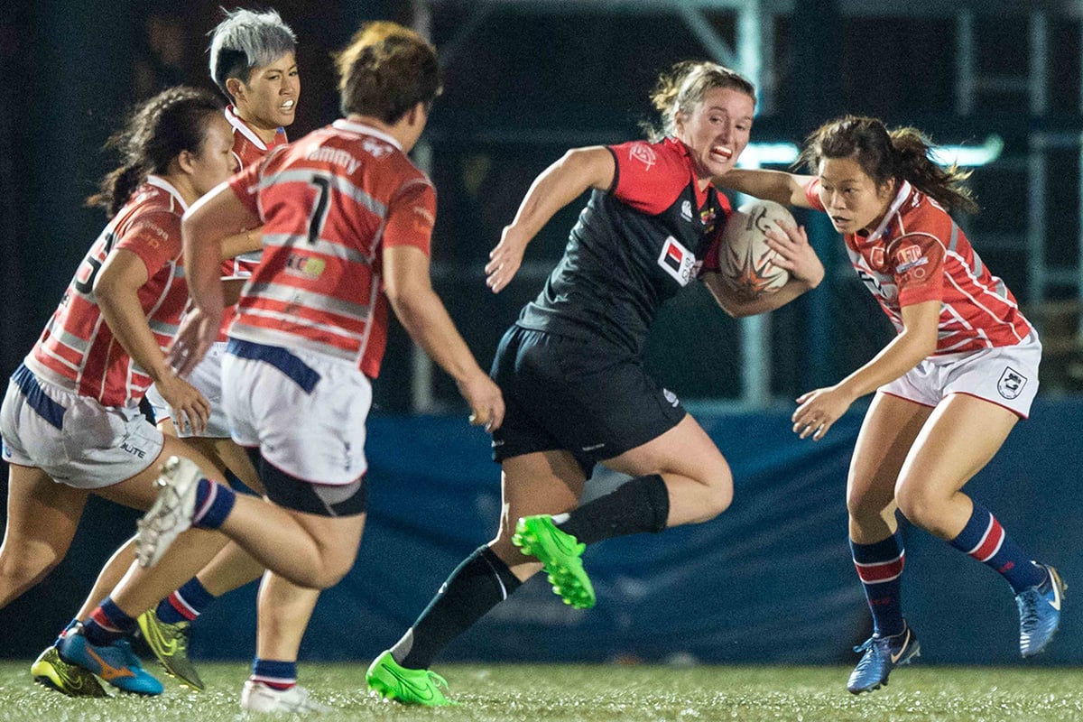 Valley Black Ladies fullback Olivia Coady baffles the Gai Wu defence by running in five tries for the two-time HKRU Women’s Premiership champions in a 49-12 romp at King’s Park on Saturday. Photos: HKRU
