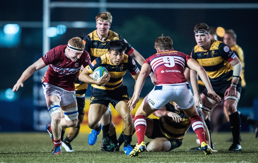 Winger Eric Kwok Pak-nga (centre) and his USRC Tigers team-mates are hoping to reverse last weekend’s defeat by HK Scottish when the two teams meet again in Saturday’s first round of the Grand Championship. Photo: HKRU