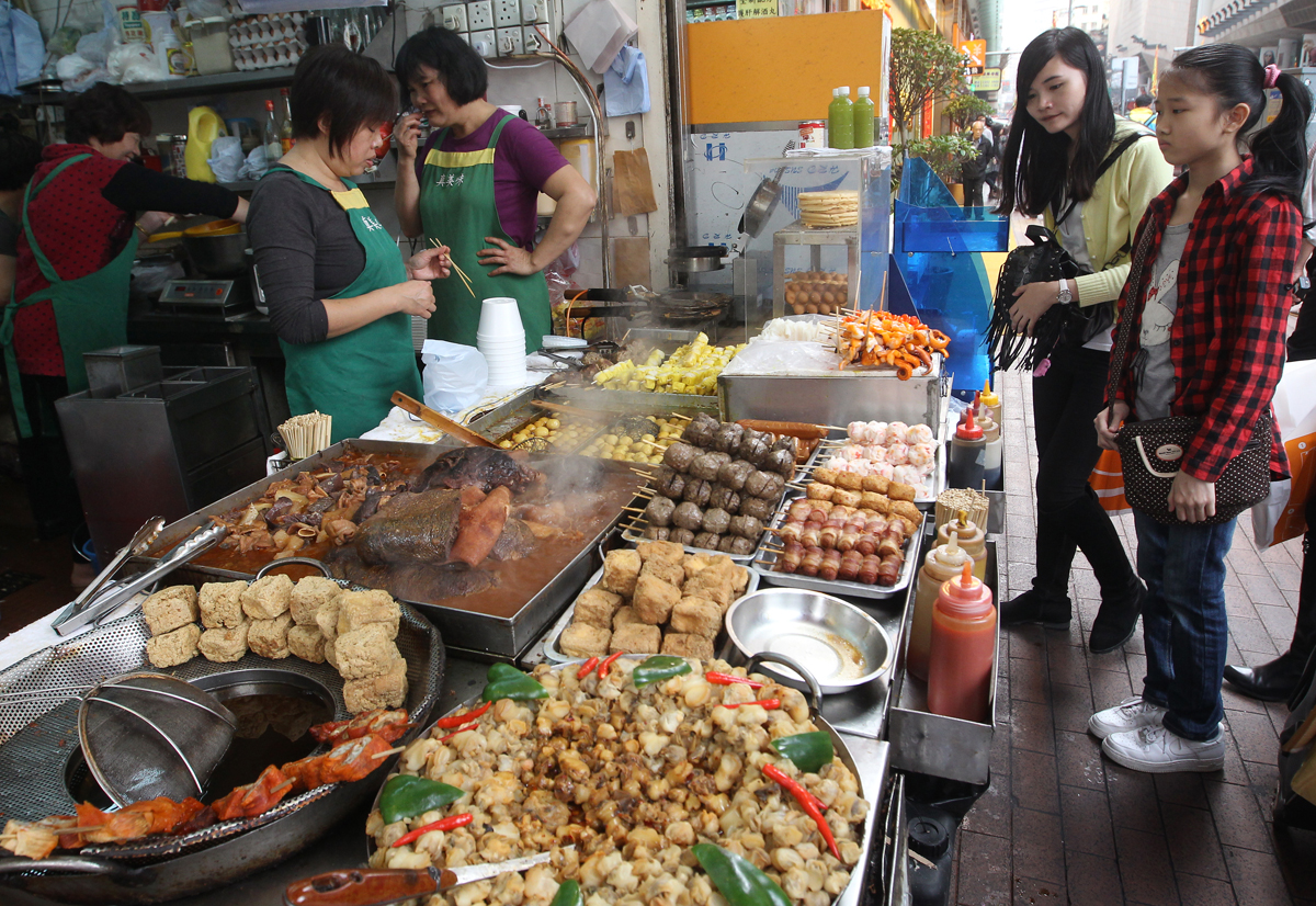 Customers buy fishballs in a snack shop at the junction of Argyle Street and Portland Street, Mongkok. Photo: Edward Wong
