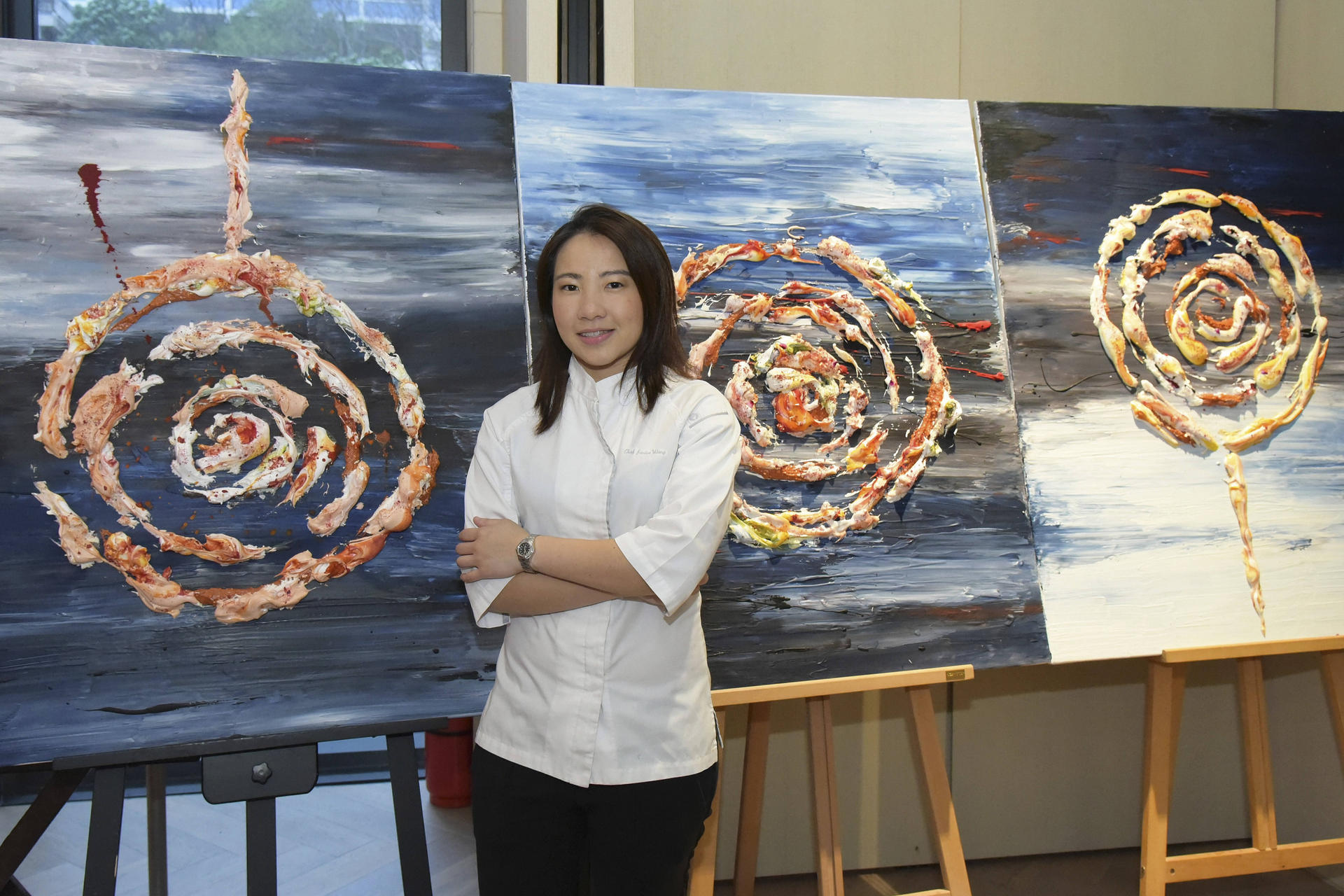 Janice Wong with one of her edible artworks, called Lollipop.