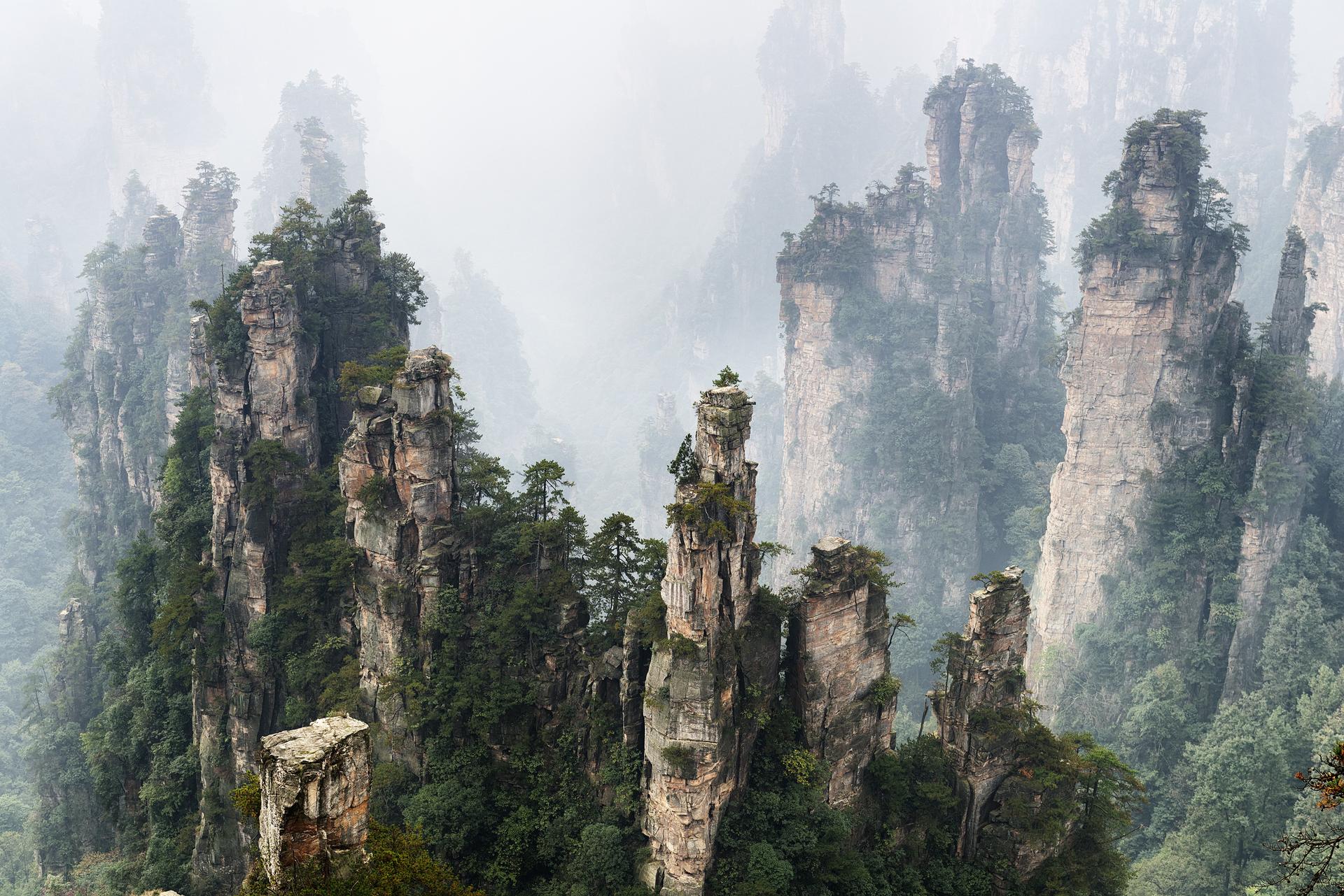A single day of trekking in the "scraggy, foggy mountains of Zhangjiajie" was too much for the writer. Photos: Corbis; Xinhua; Cecilie Gamst Berg