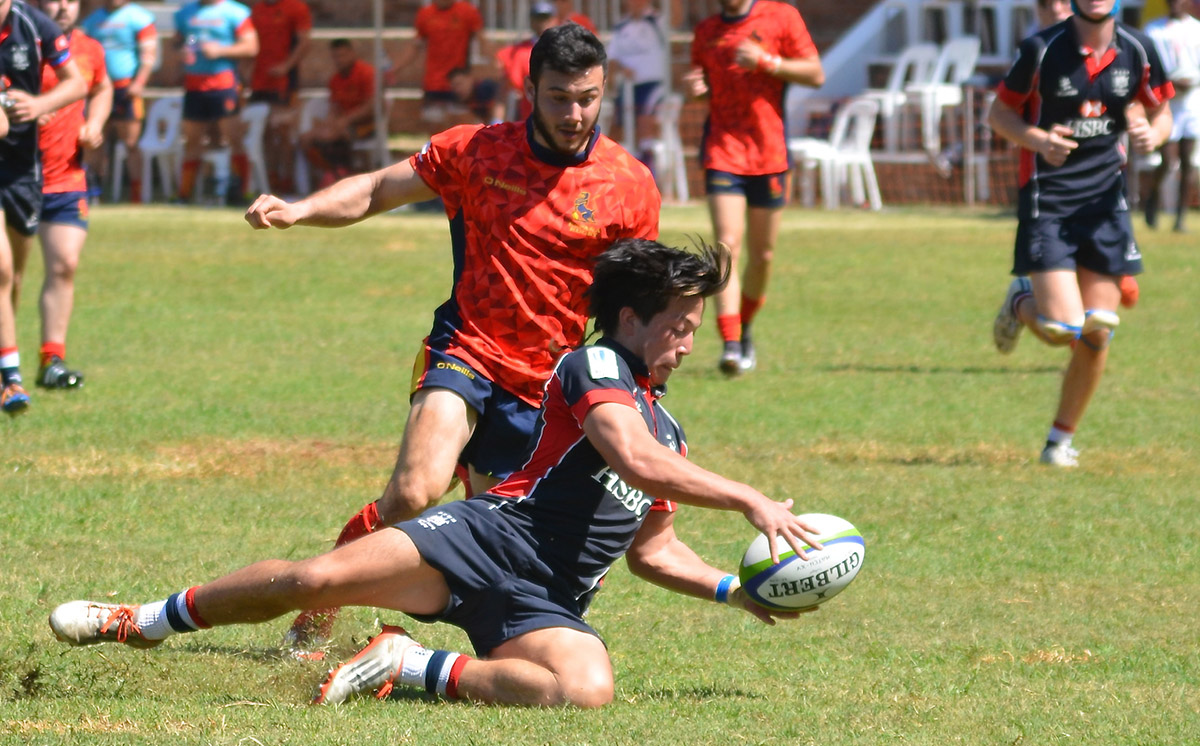 Hong Kong’s James Christie scrambles for the loose ball in a losing effort against Spain in the World Rugby U20 Trophy in Zimbabwe on Tuesday. Photos: HKRU