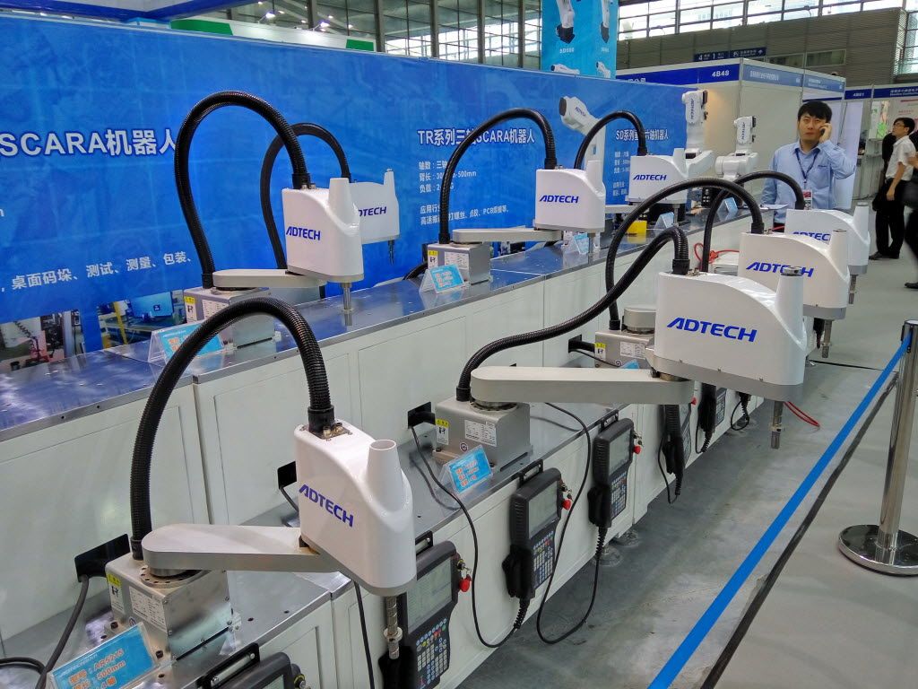 Industrial robots are becoming an increasingly common sight at manufacturing plants in China. Photo: ImagineChina