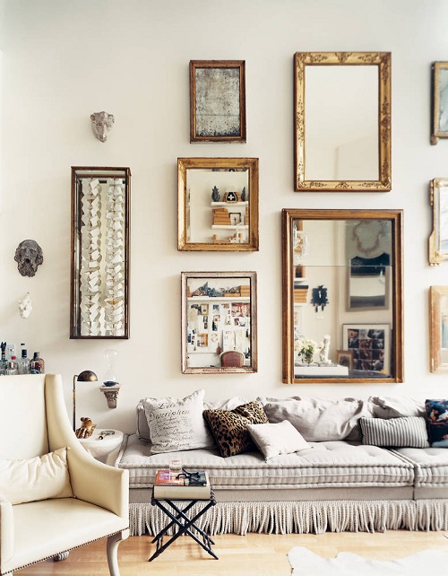 Mirrors in frames of varying shapes and sizes make an eye-catching gallery