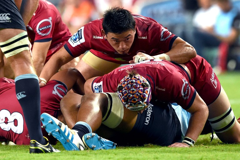 Ayumu Goromaru of the Queensland Reds looks over the top of a ruck during a Super Rugby match against the Waratahs in Sydney in February. The Rugby World Cup hero from Japan will face his country’s new Super 18 franchise Sunwolves this weekend in Brisbane. Photos: AFP