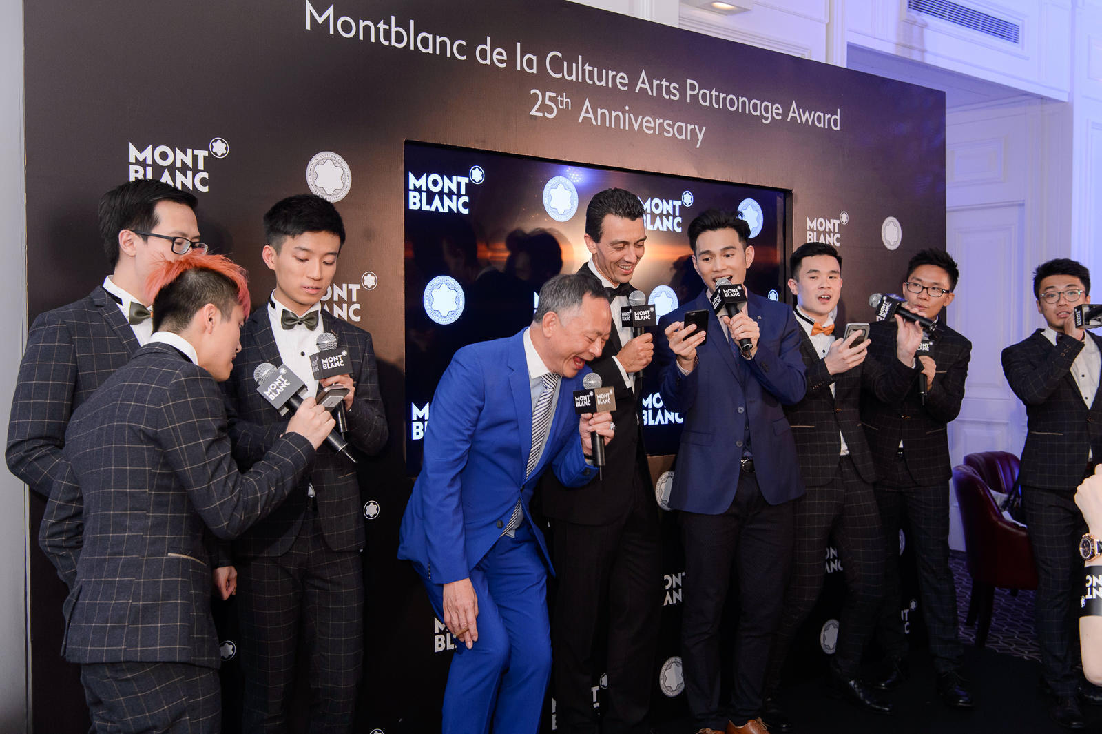 Johnnie To jamming with Julien Renard and Jonathan Wong at the Montblanc soiree.