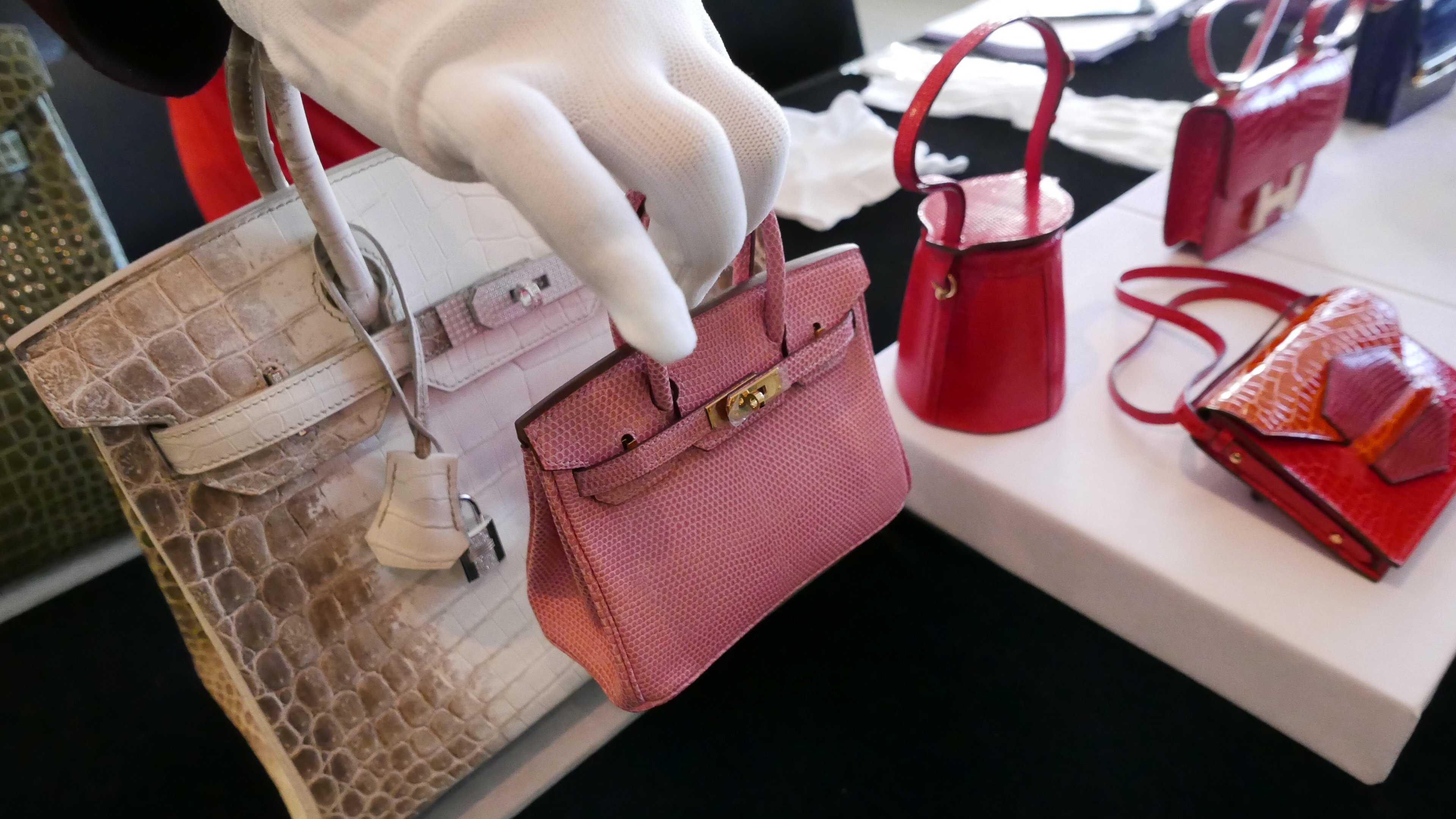 Behind the scenes at Christie's blockbuster handbag sale - including  diamond-encrusted Hermes Birkins