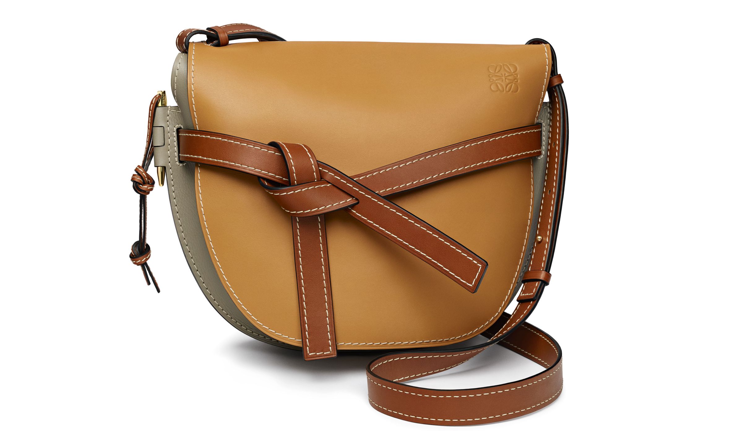 Saddle-shaped Gate bag is skillfully handcrafted from high-end leathers, designed to wear beautifully over time. 